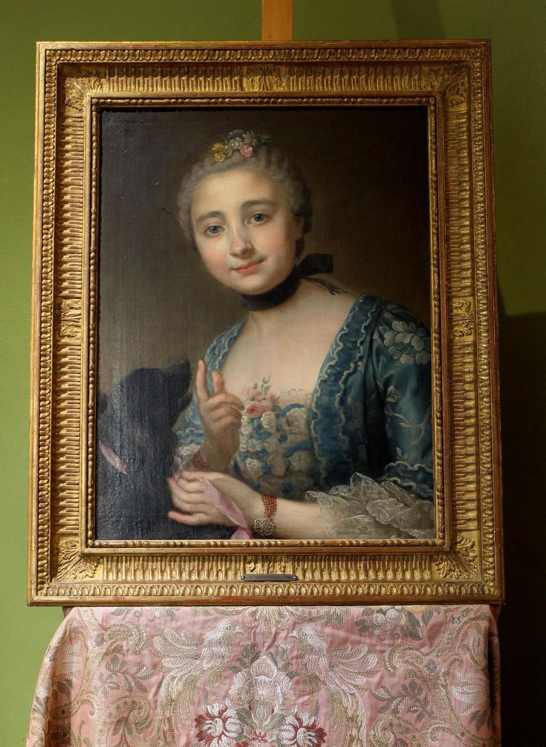 Wonderful French Old Master Louis XV period oil on canvas painting portrait of a lady with her dog by Donatien Nonnotte signed and dated 1760, a striking painting in the Rococo fashion manner.
D. Nonotte was the pupil and student emeritus of