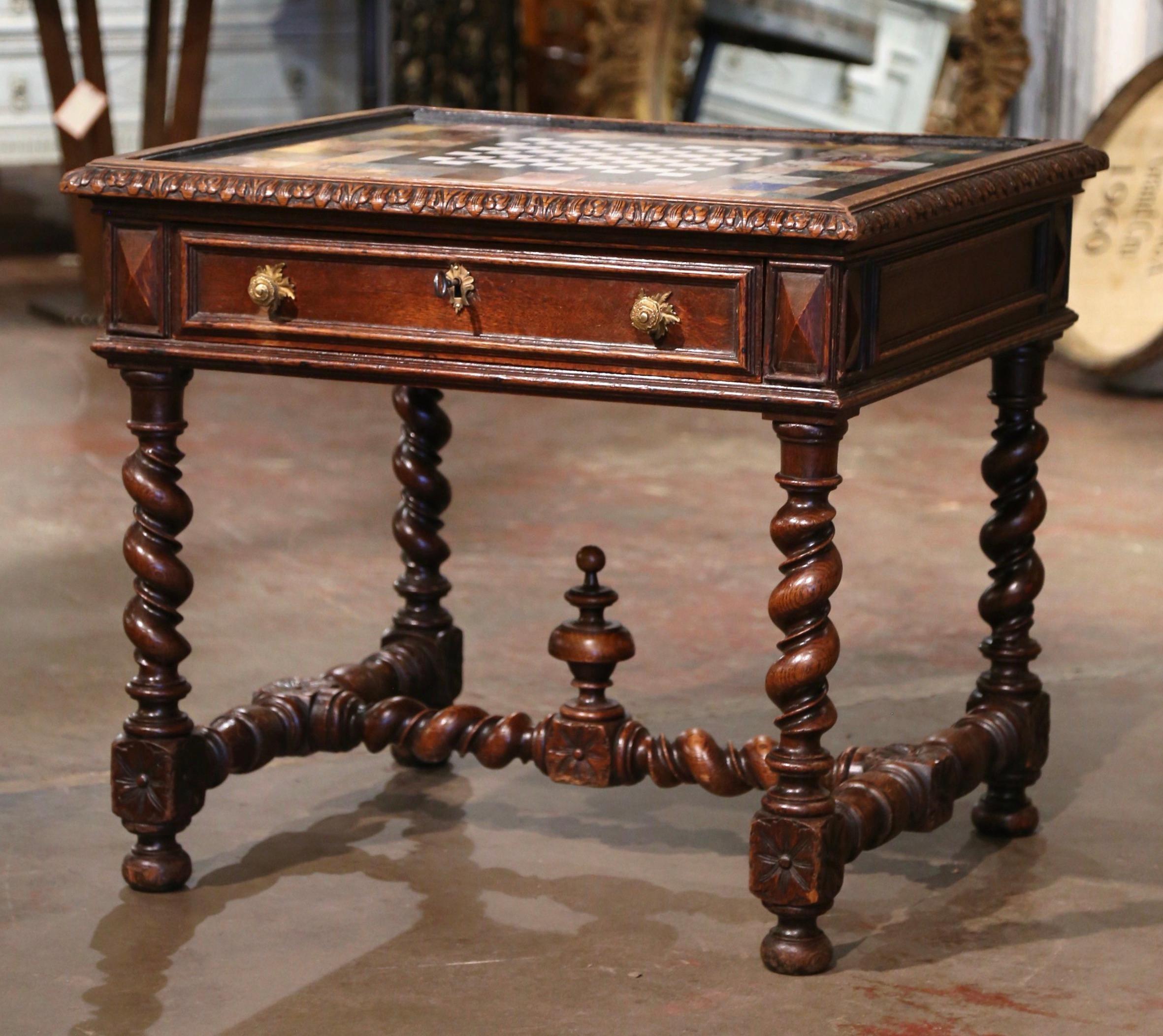 Decorate a den or game room with this elegant antique card table. Crafted in southern France circa 1780, the table stands on thick barley twist legs decorated with diamond shape medallions at the shoulder, and connected at the base with a twisted H