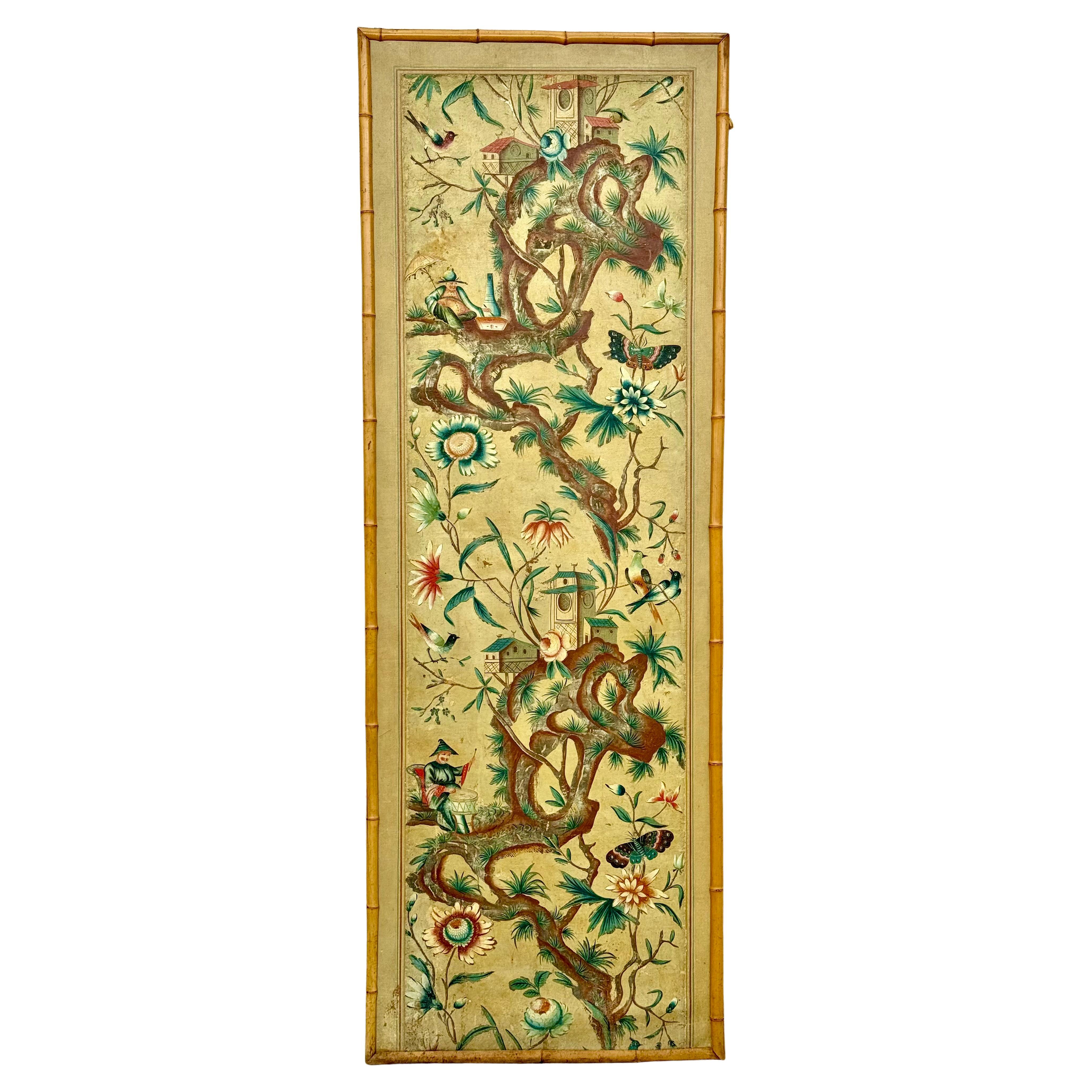 Elegant 18th / 19th century hand-painted French or Italian Chinoiserie panel. Panel features colorful branches filled with exotic birds, flowers, butterflies, and Asian characters and architecture. Faux bamboo frame adds sophistication to the