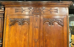 18th Century French Ornately Carved Two-Door Cherrywood Armoire