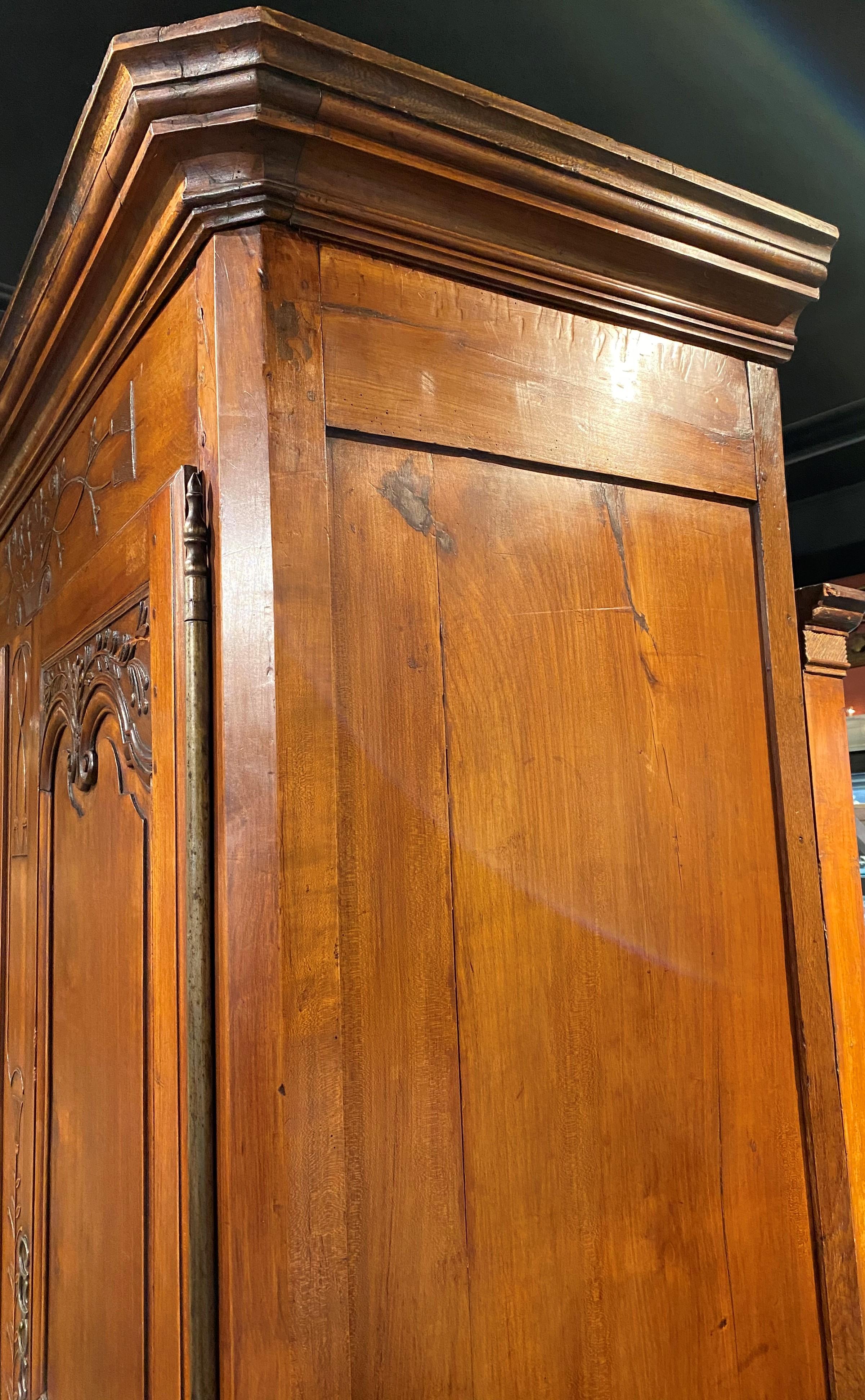Brass 18th Century French Ornately Carved Two-Door Cherrywood Armoire