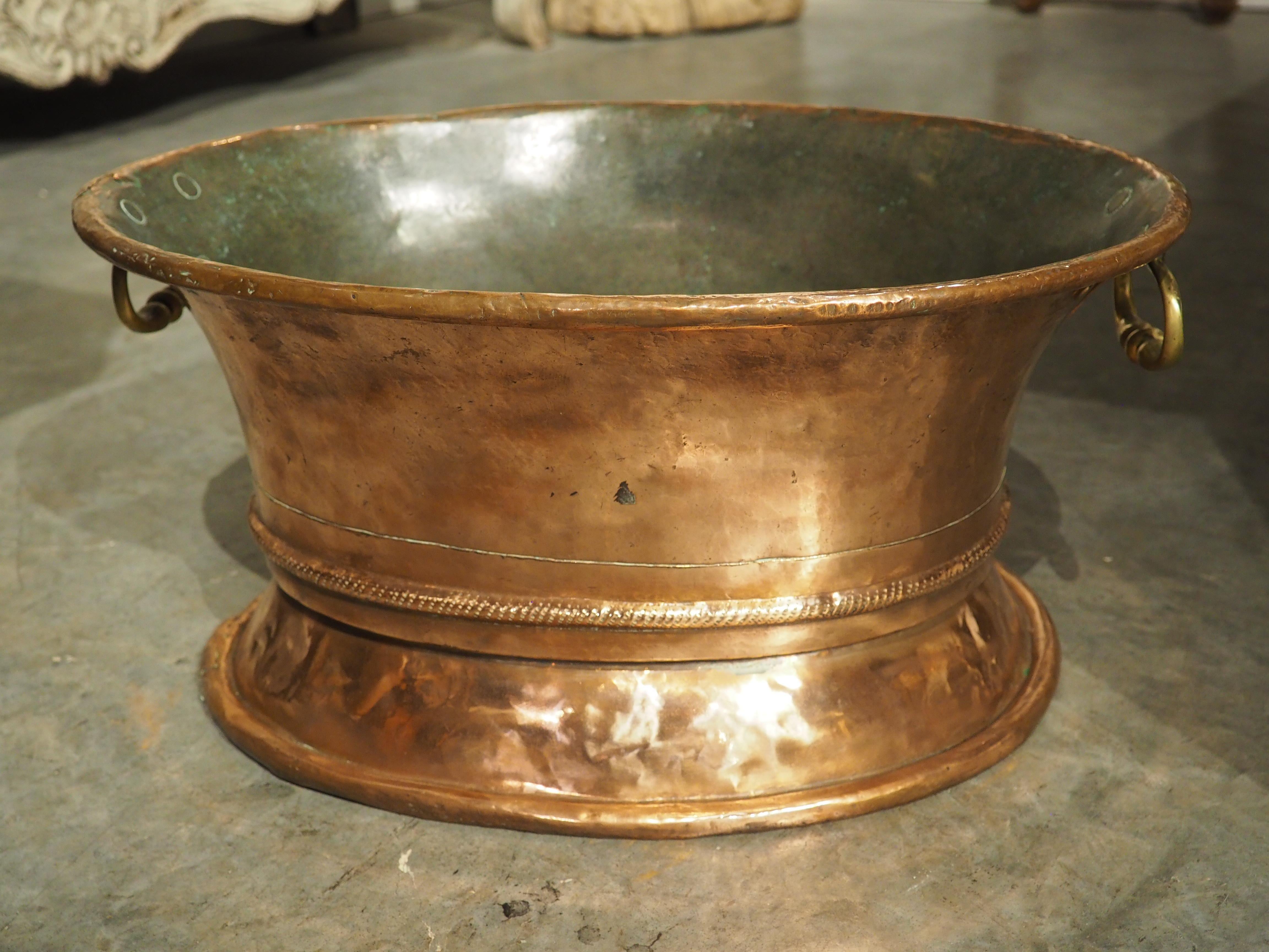 More information coming soon…

Dating to the 1700s, this oval copper receptacle is known as a rafraîchissoir.  The brass handles on opposing sides make it easy to carry, even when laden with ice and wine bottles.