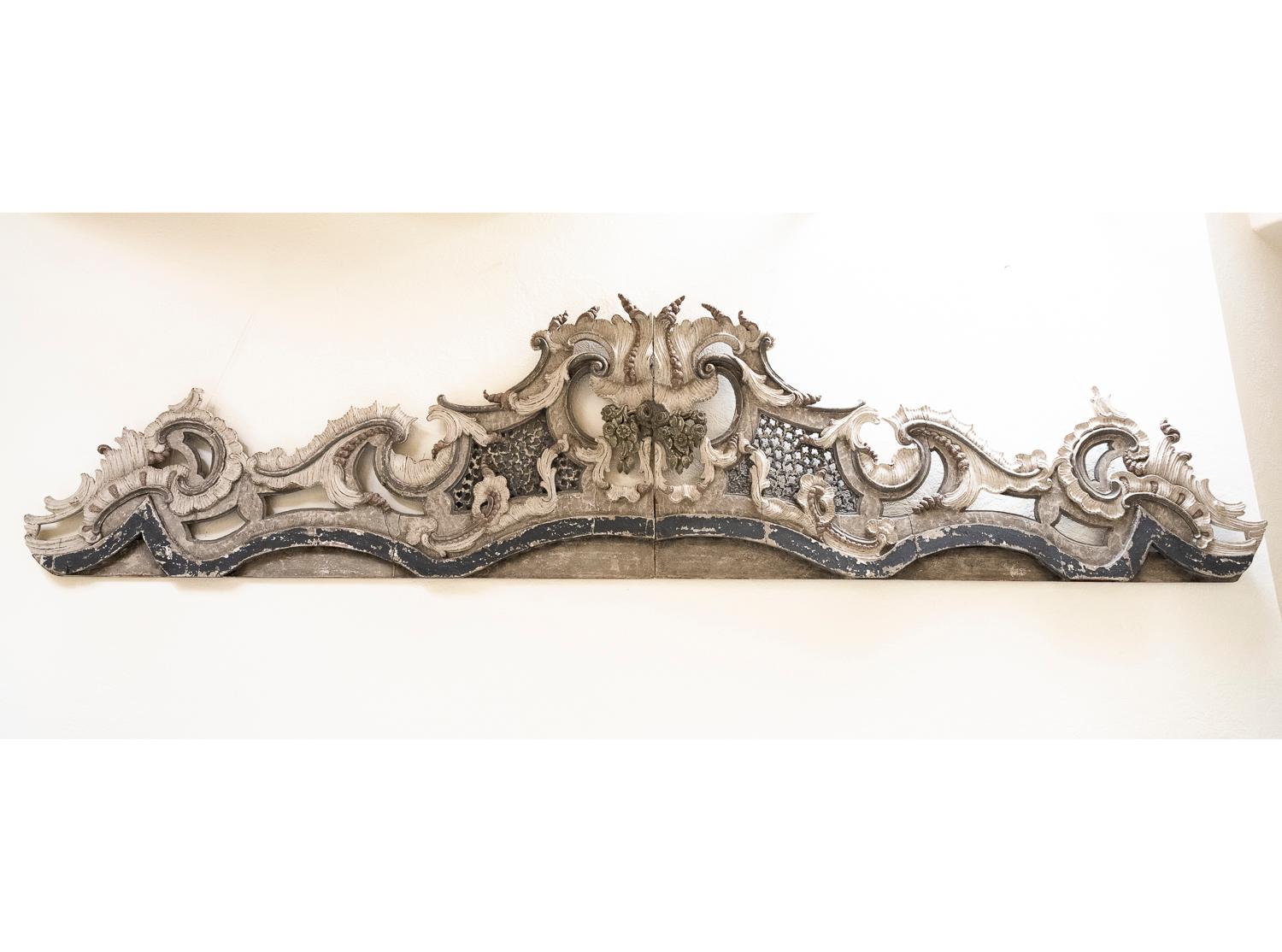 This rather large “fronton” or pediment spent the last 250 years dominating the entrance doors to an hotel particulier — or city mansion — in Lyon, France. Made of carved wood that was then painted, it is composed of 2 pieces that connect in the
