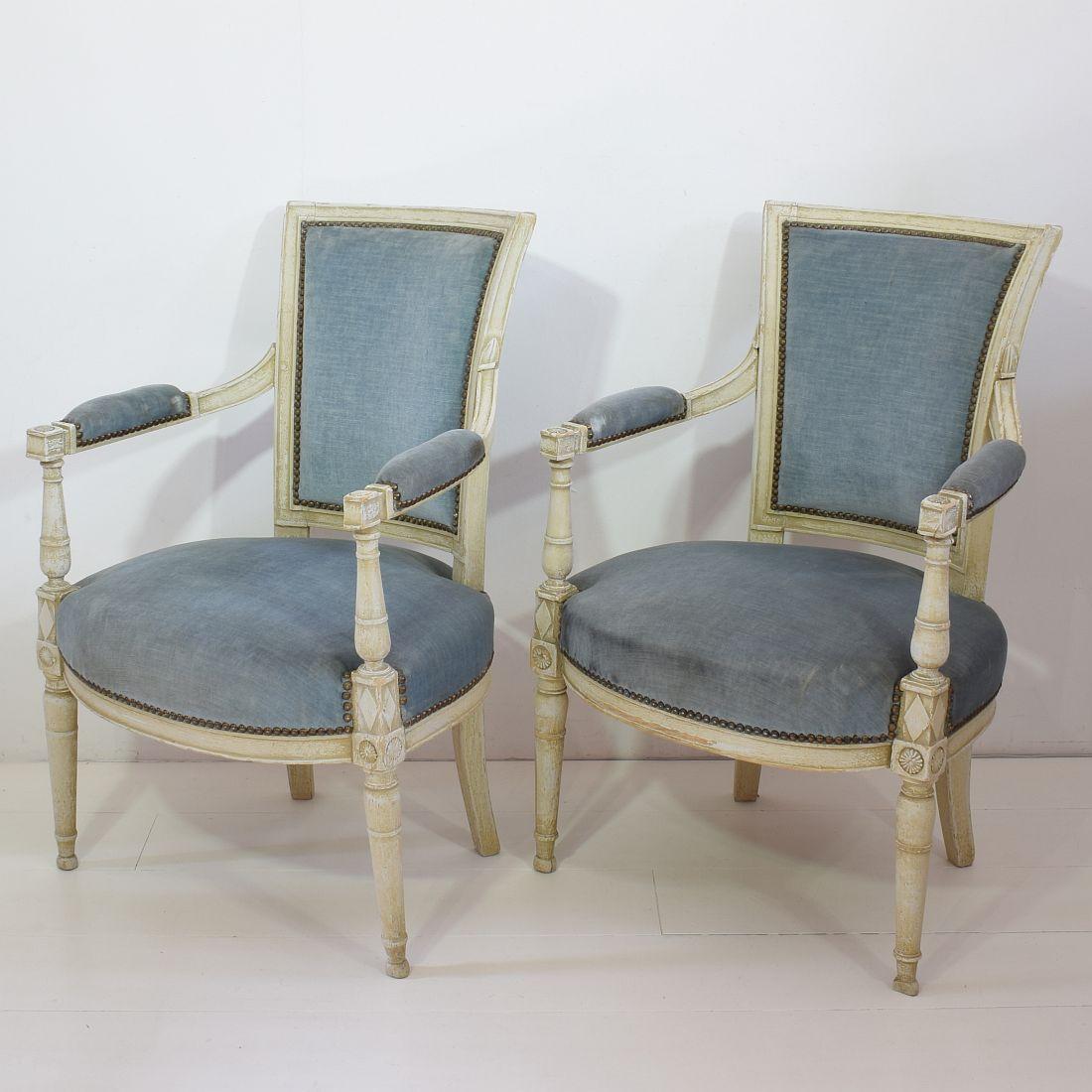 Beautiful pair of French original Directoire chairs, France, 18th century.
Measures: Seat height is 46 cm. Weathered, small losses and old repairs.
Despite of their high age, the chairs are in a relative good condition but could need some