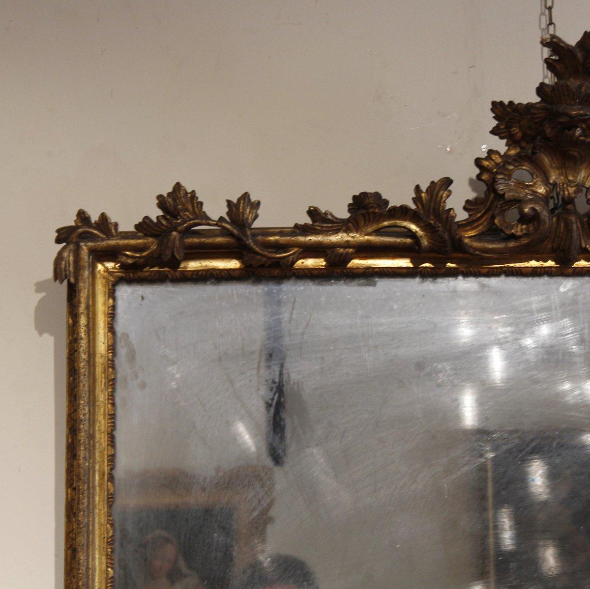 An impressive pair of Louis XV mirrors, the quality of the carving and the mirrors originally of the period make these two pieces a really pair of artworks.