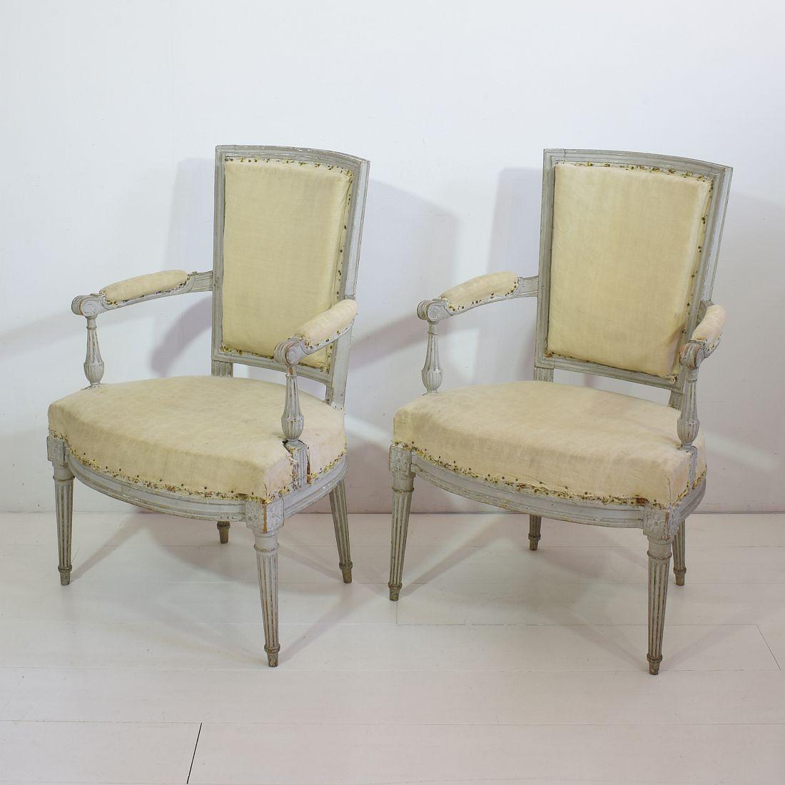 Beautiful pair of Louis XVI chairs with stunning old color,
France, 18th century. Despite of their high age, the chairs are in a relative good condition but of course need some attention and new lining.
Measures: Seat height is 42 cm. Weathered,