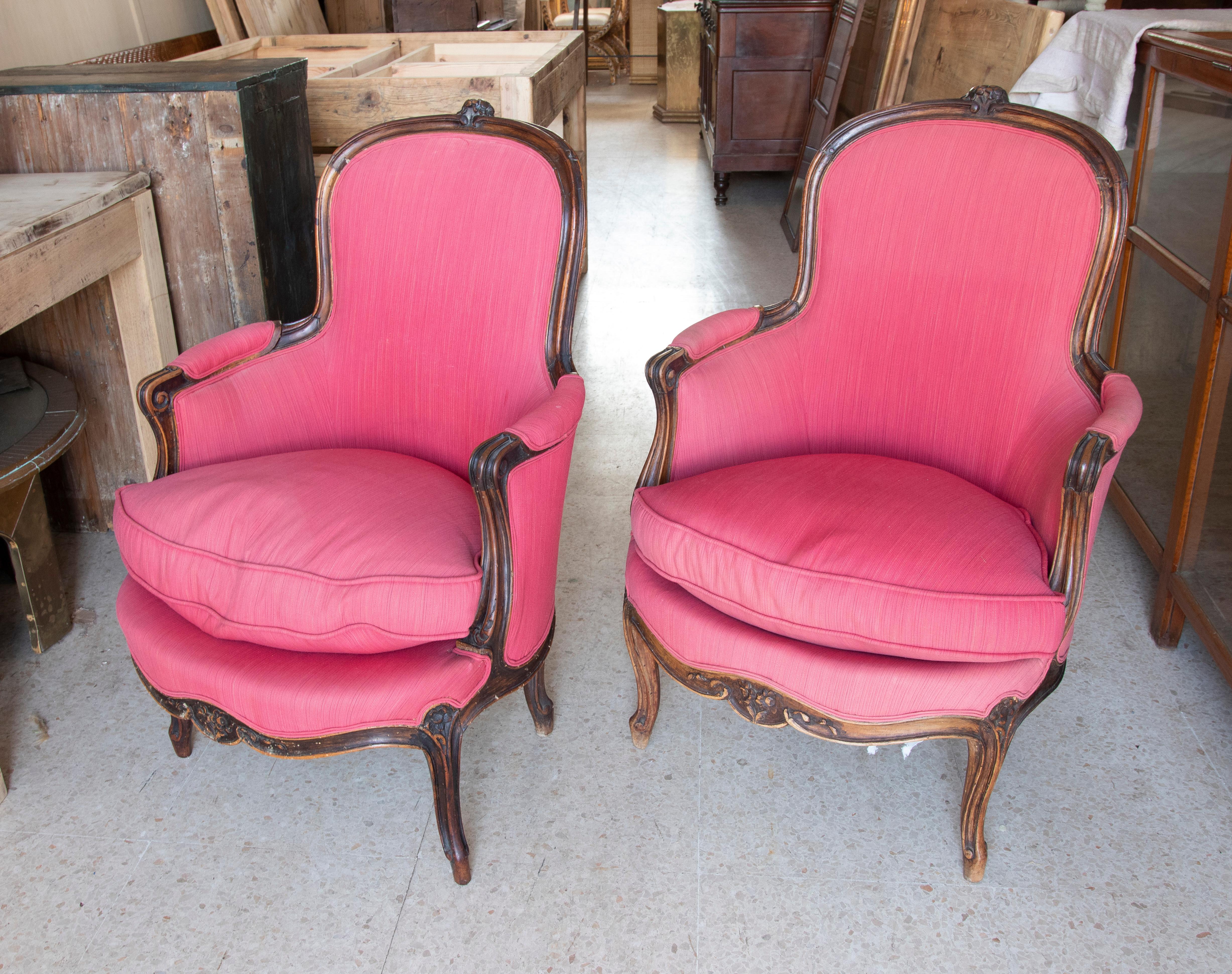 18th century French pair of wooden upholstered armchairs.