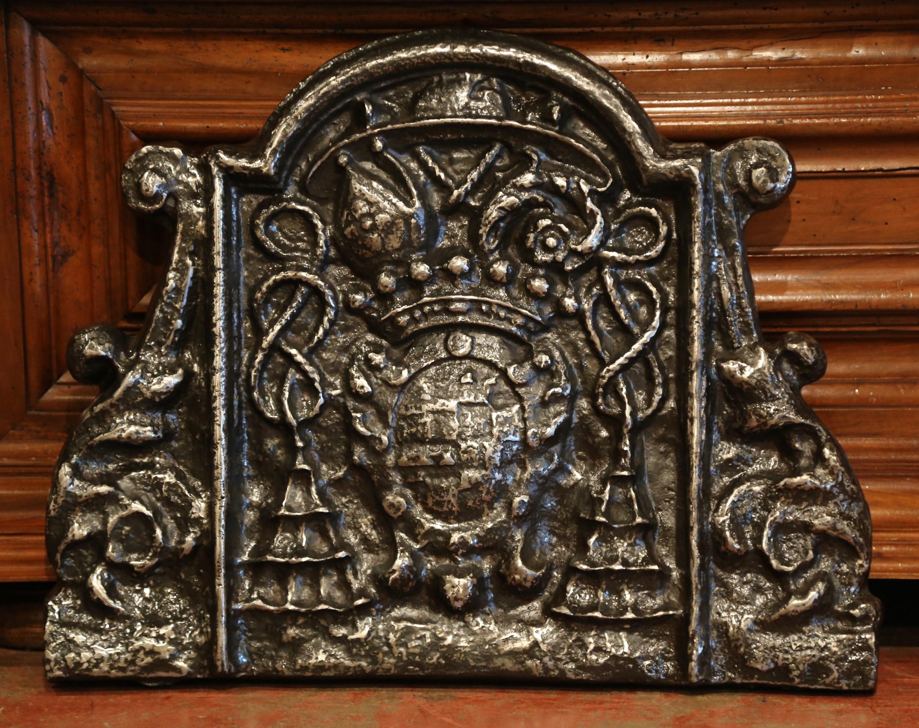 18th Century French Polished Iron Fireback with Family Crest and Tassel Decor In Excellent Condition In Dallas, TX