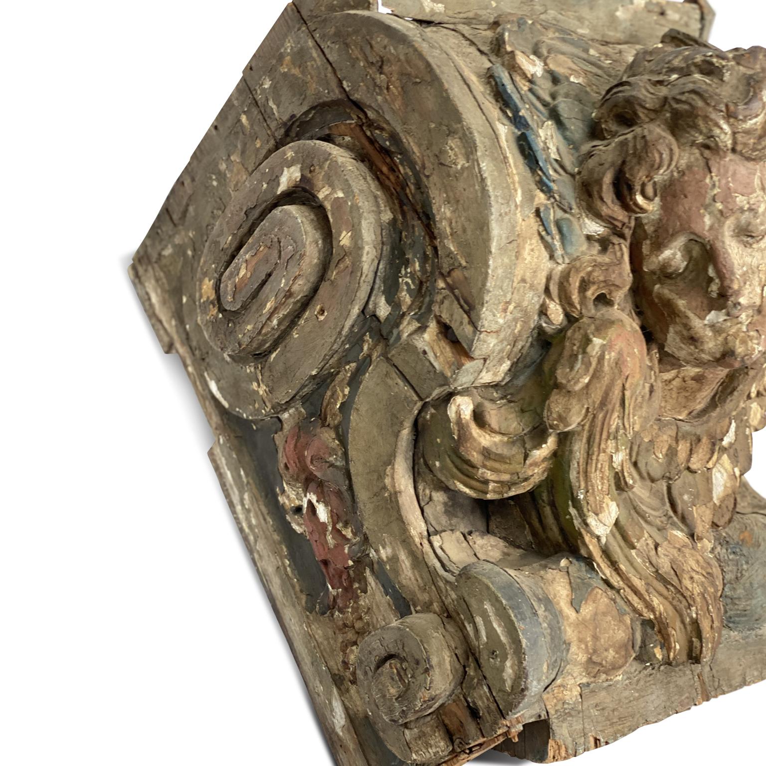 Magnificent 18th century French angel from top of a column. From a cathedral in Provence. The expression on the angels face is so moving. The colors are rich and deep with salmon and deep French blues. This piece would be stunning on top of a door,