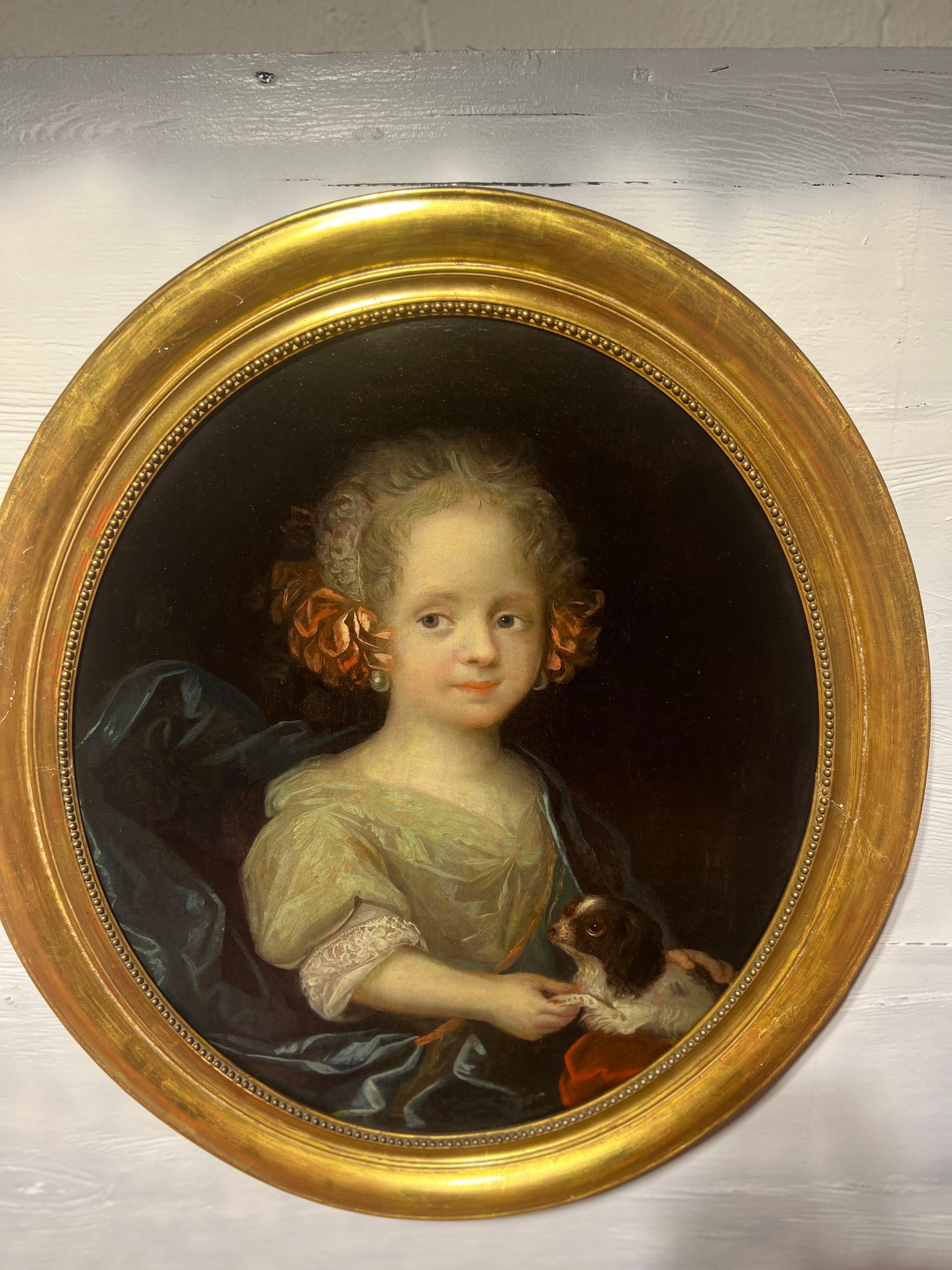 The 18th Century French Portrait of a Young Girl and Dog, attributed to Vigée Le Brun, is a captivating and tender representation of the era's portraiture. This exquisite painting showcases the artist's skill in capturing the beauty and innocence of