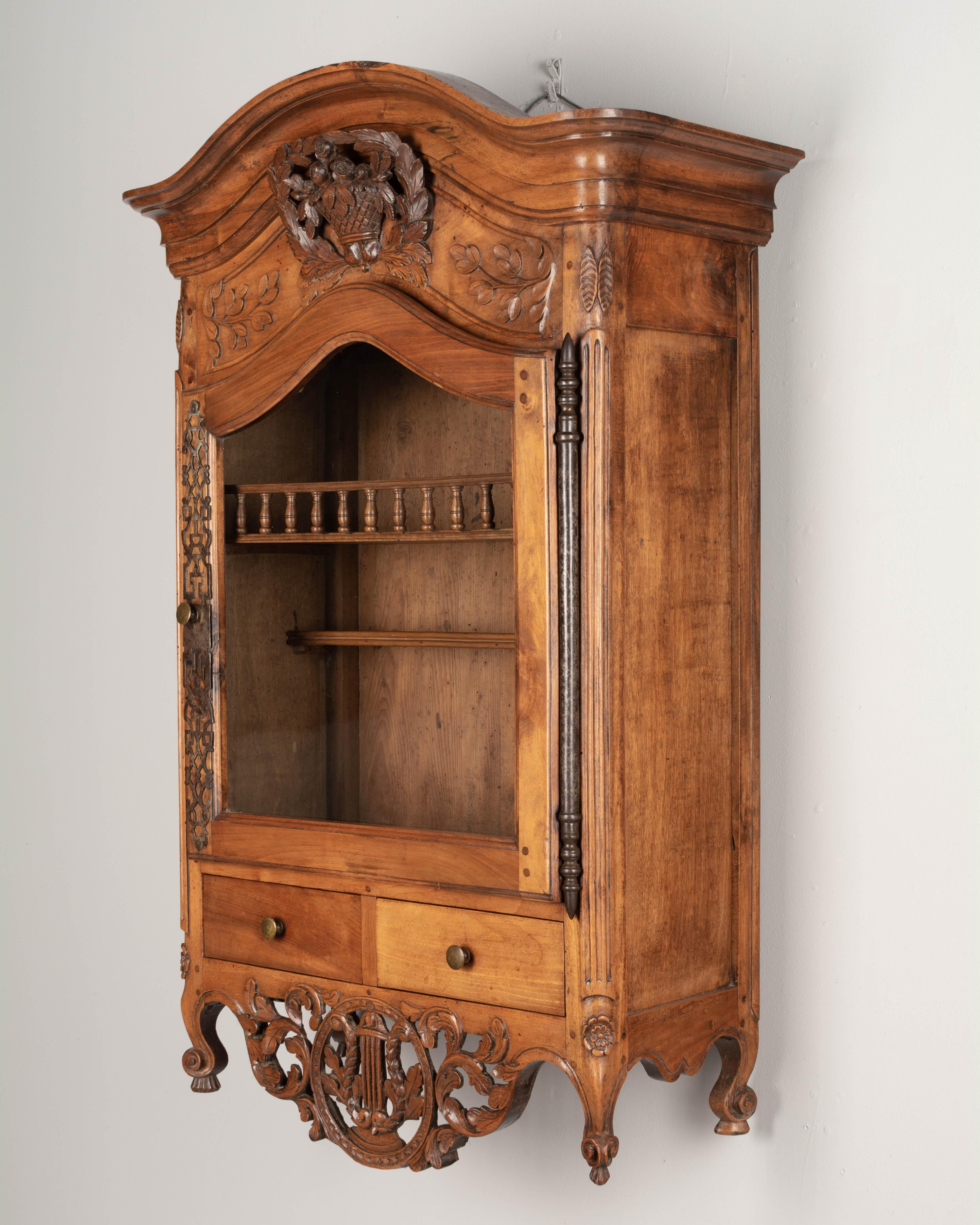 Hand-Carved 18th Century French Provencal Verrio or Wall Cabinet For Sale
