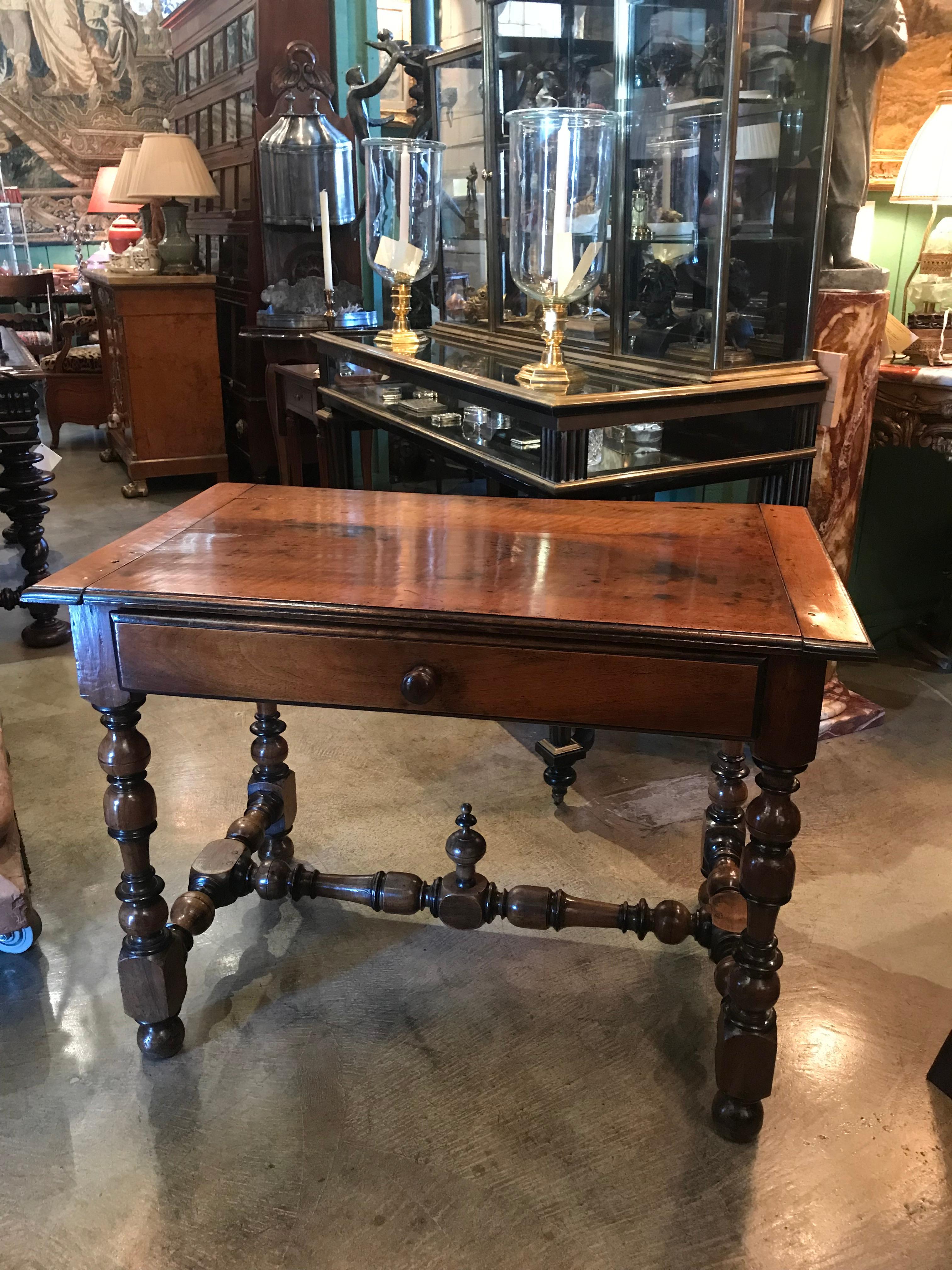 Antique French Hand Carved wood writing desk / center / side Table rustic Farm . 18th century French Provencal walnut writing table the walnut gives it much Charm and warmth . It could be perfect as a side table between Two Chairs . In the bedroom