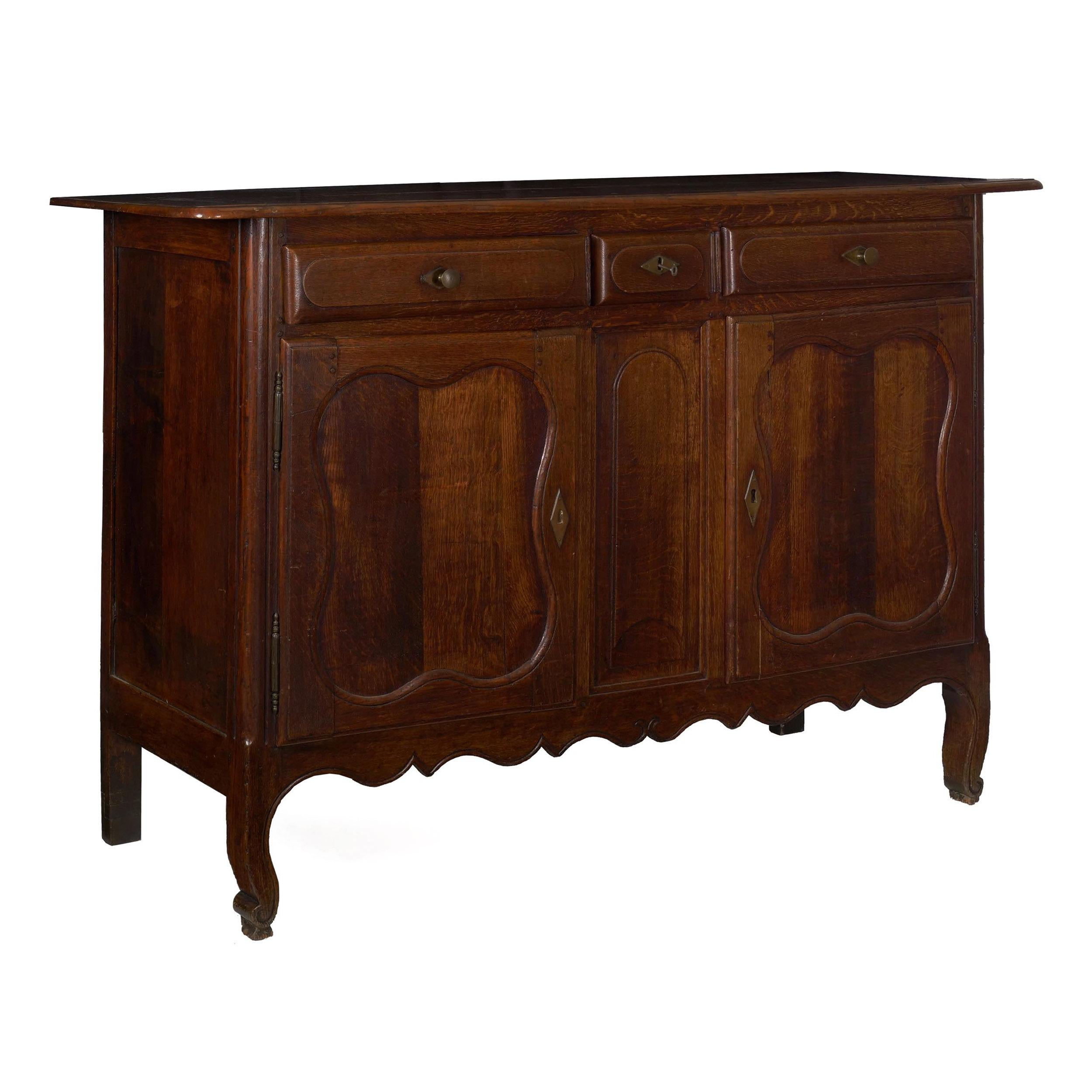 French Provincial patinated oak server cabinet,
circa 19th century with 18th century components
Item # 007DLG08P 

A large and striking serving cabinet, this attractive piece brings a much needed sense of surface history to the interior. With a