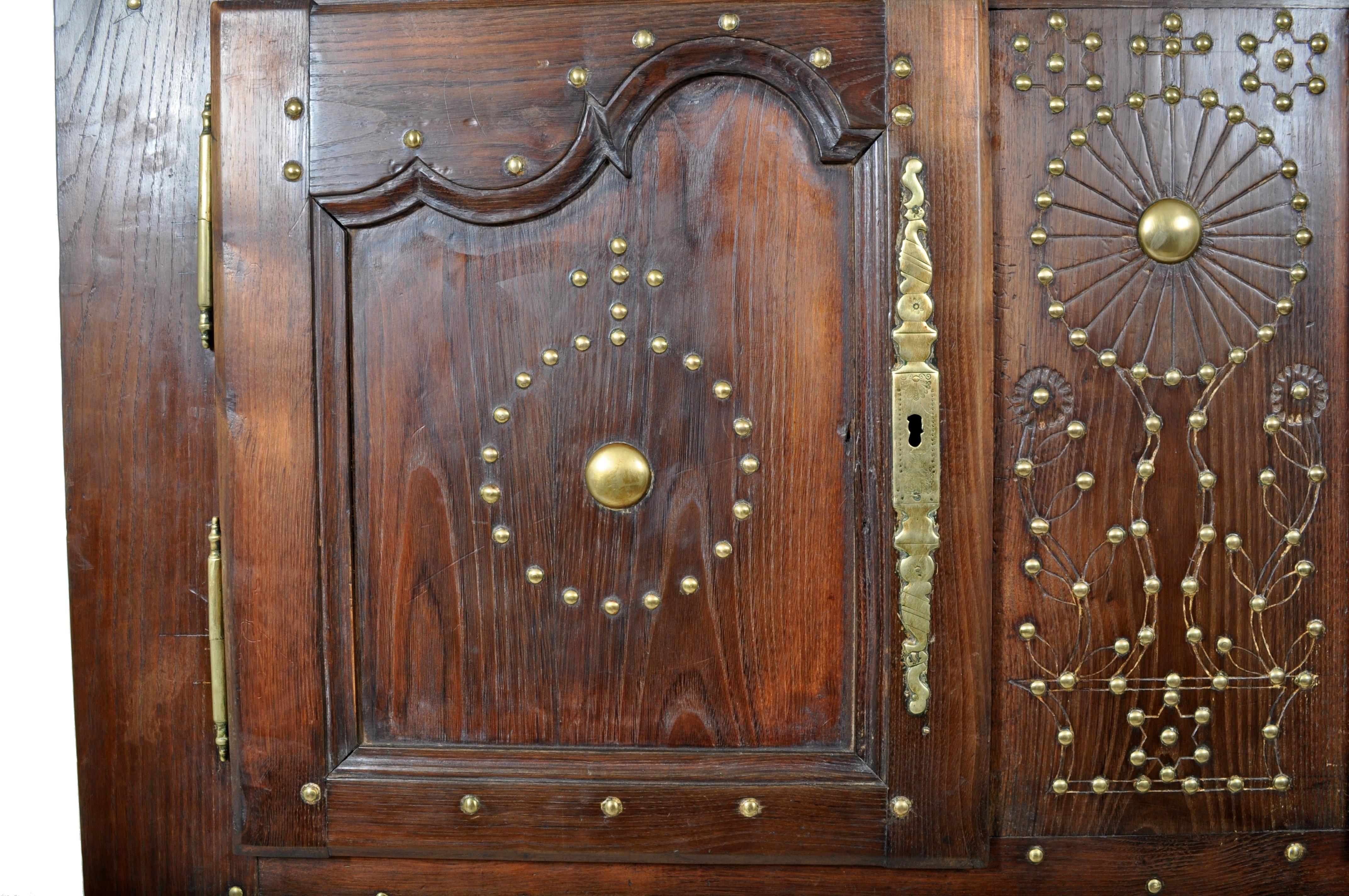 18th Century French Provincial Chestnut Brass Studwork Cabinet Cupboard Ca. 1720 In Good Condition For Sale In Portland, OR