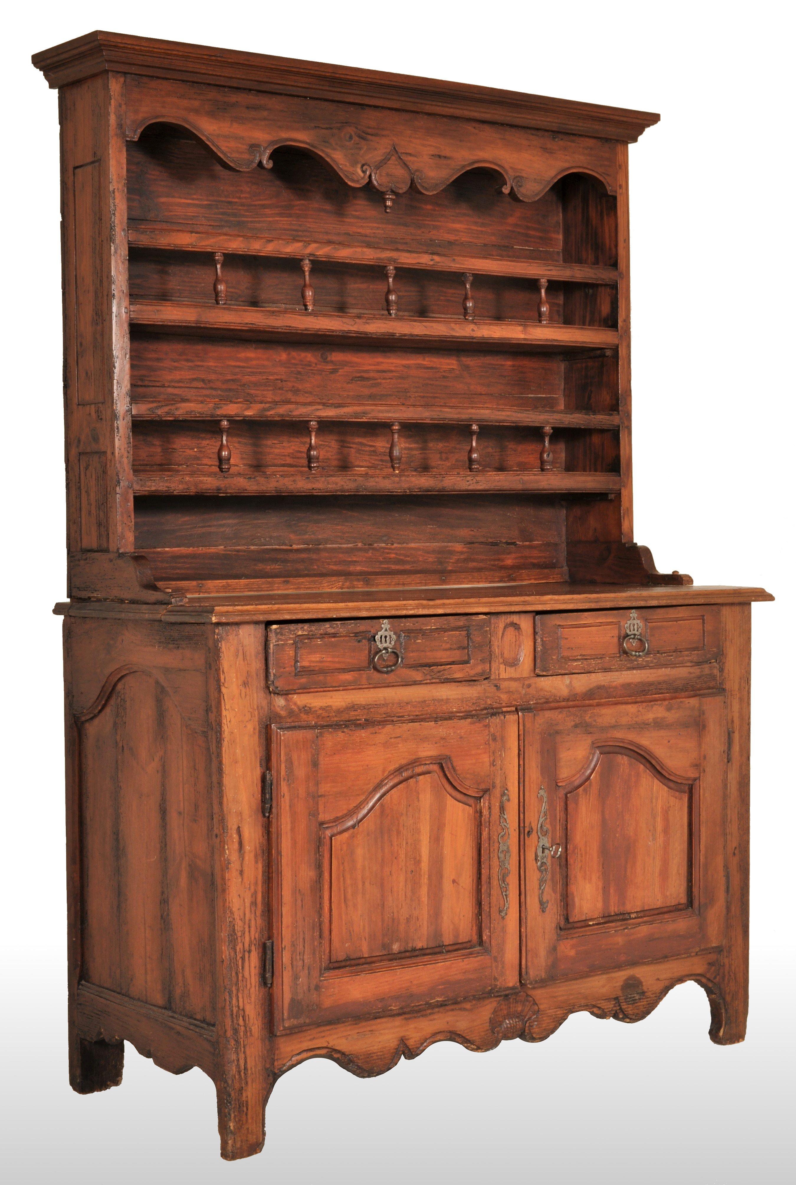 Antique 18th century French provincial dresser / buffet / sideboard / server / vaisselier, circa 1750. An unusually diminutive normandy dresser made from walnut and pine, the back having a plate rack with two spindled shelves and a shaped and carved
