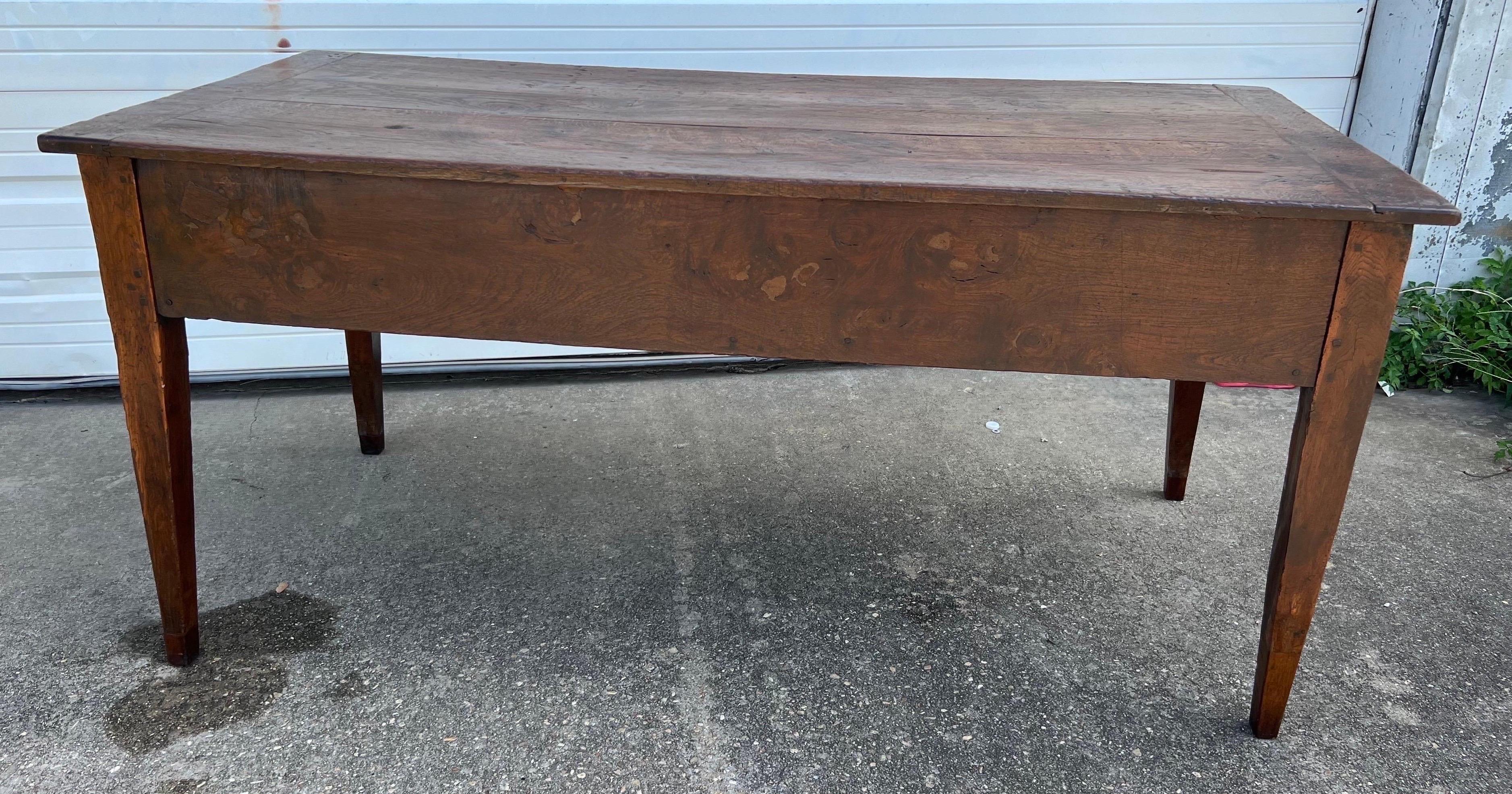 Nice rustic French provincial farm table with drawers on each end. Very charming old patches and patina throughout. Would make a great console or prep table on addition to dining. Leg clearance is 22”.