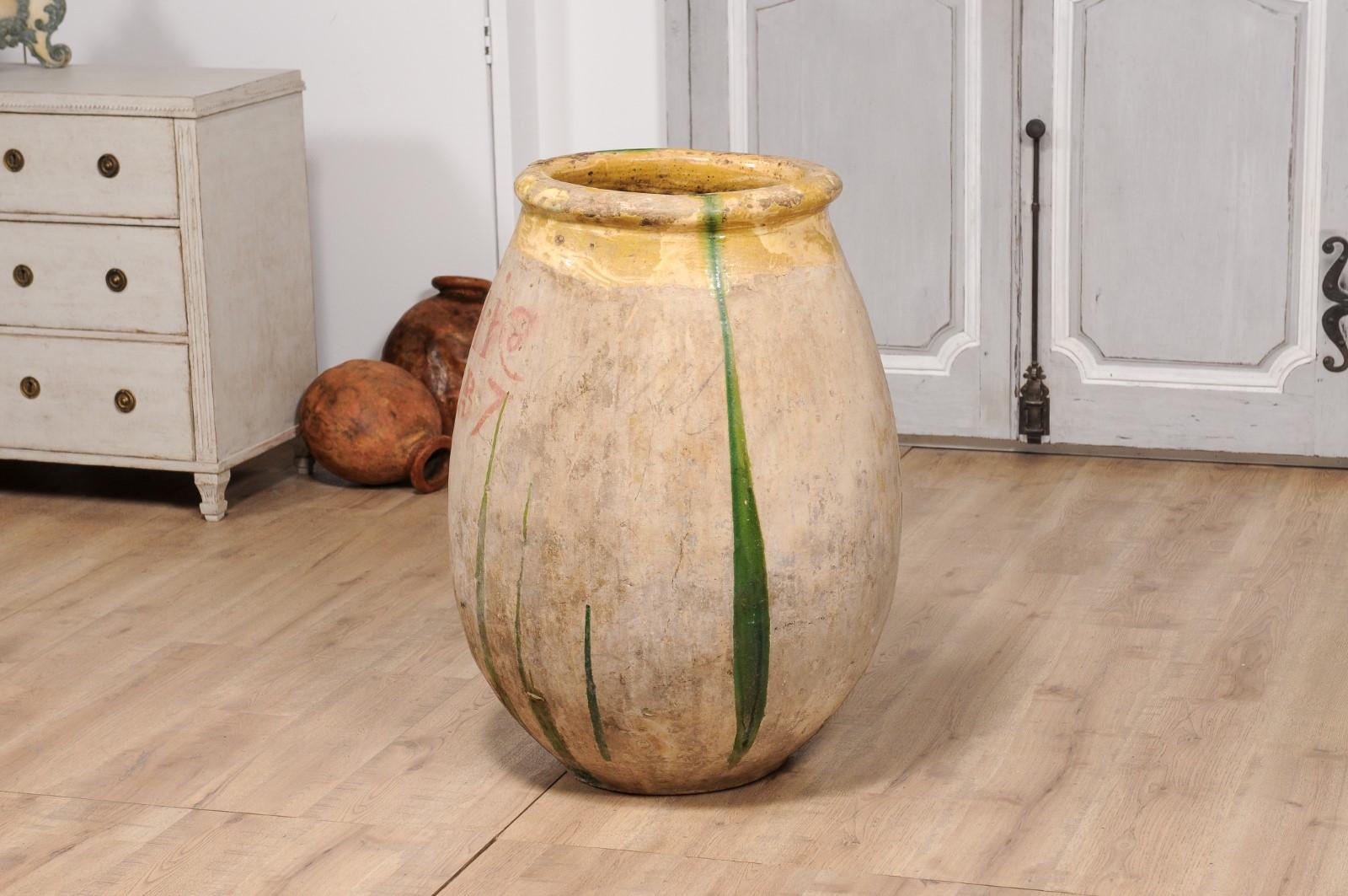 18th Century French Provincial Olive Oil Biot jar with Yellow and Green Glaze For Sale 3