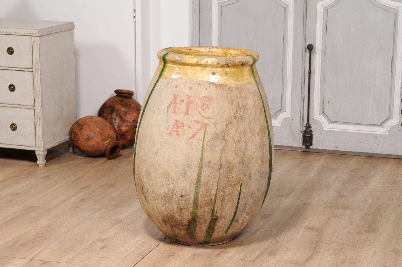18th Century French Provincial Olive Oil Biot jar with Yellow and Green Glaze For Sale 5