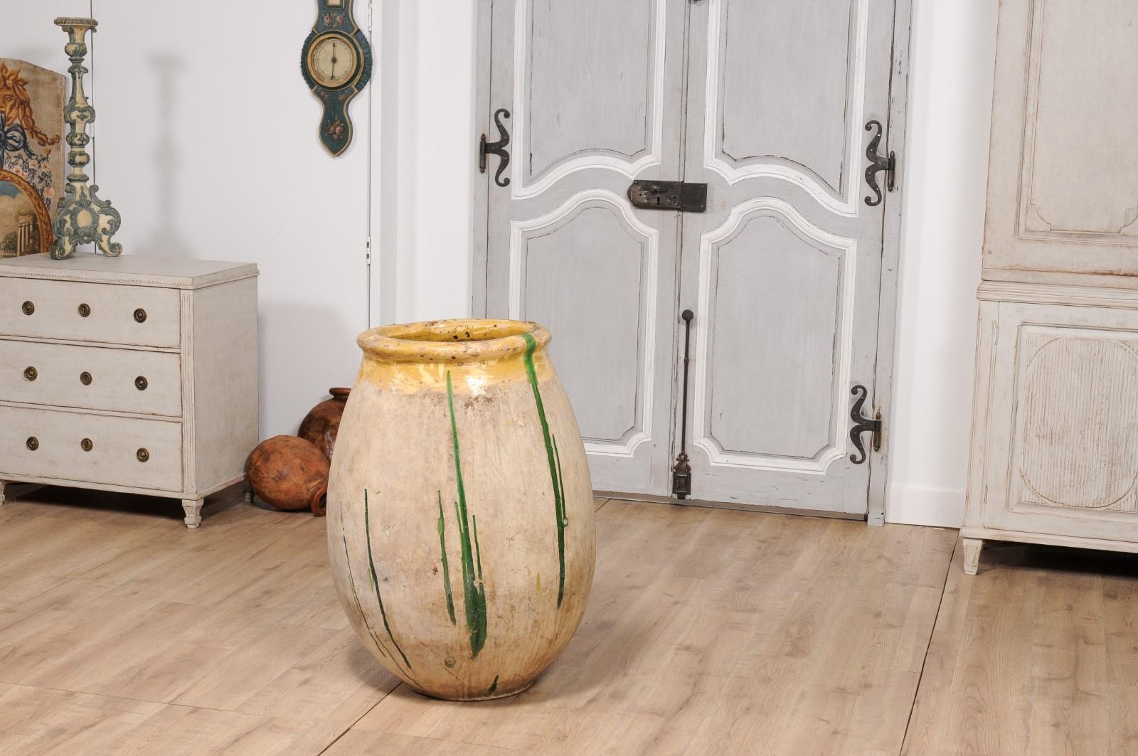 18th Century French Provincial Olive Oil Biot jar with Yellow and Green Glaze For Sale 1