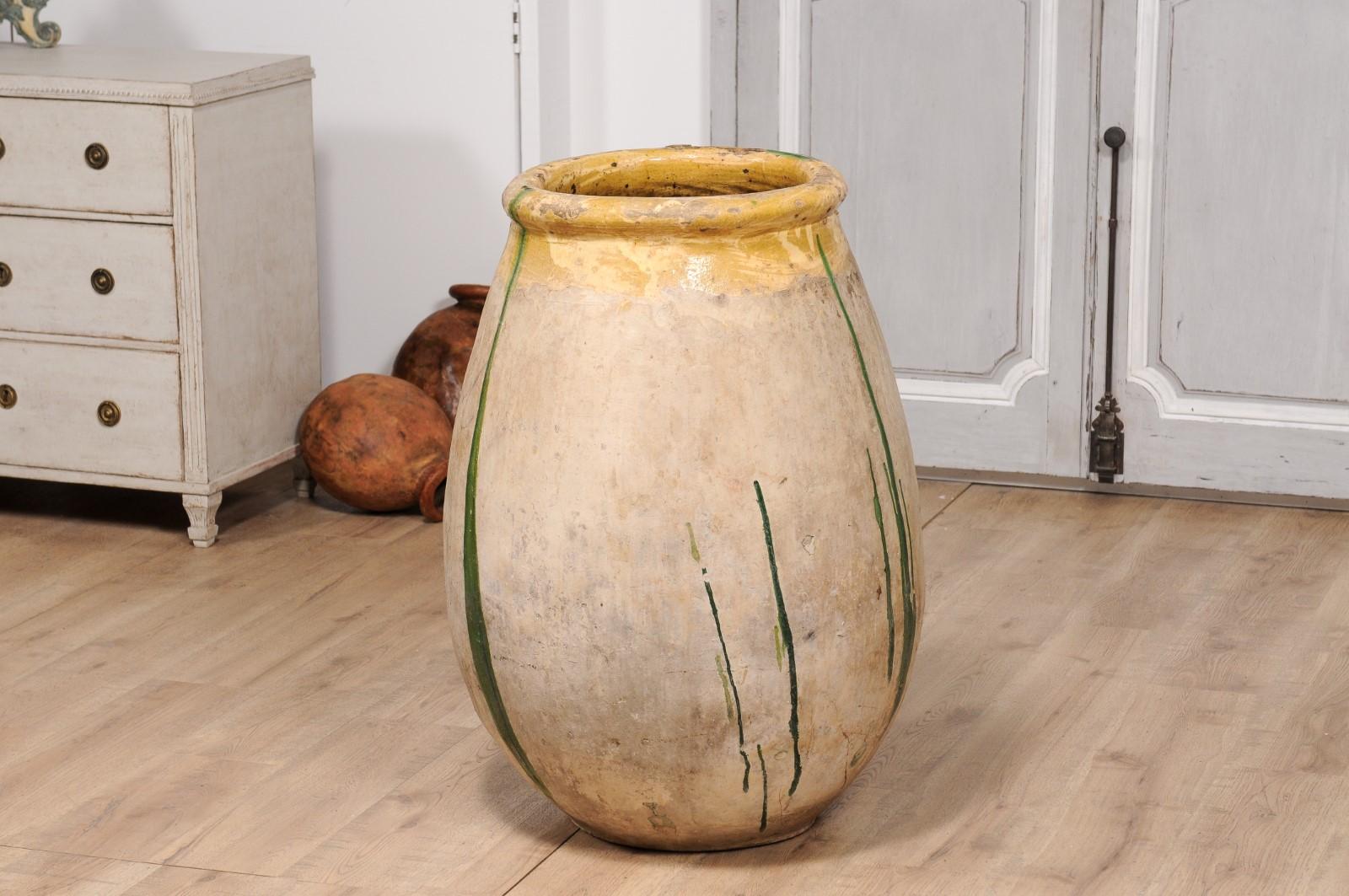 18th Century French Provincial Olive Oil Biot jar with Yellow and Green Glaze For Sale 2