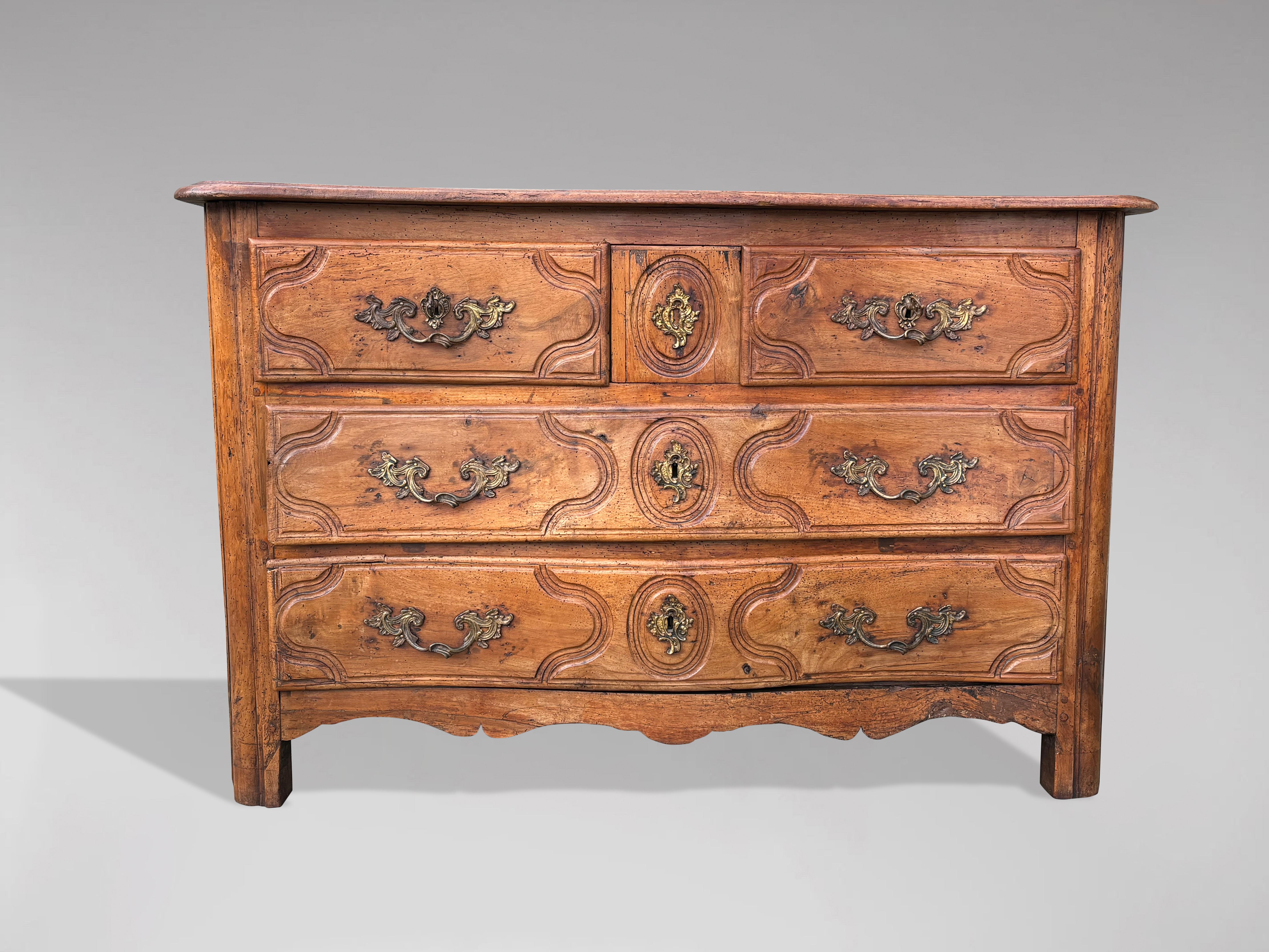 Polished 18th Century French Provincial Walnut Commode For Sale