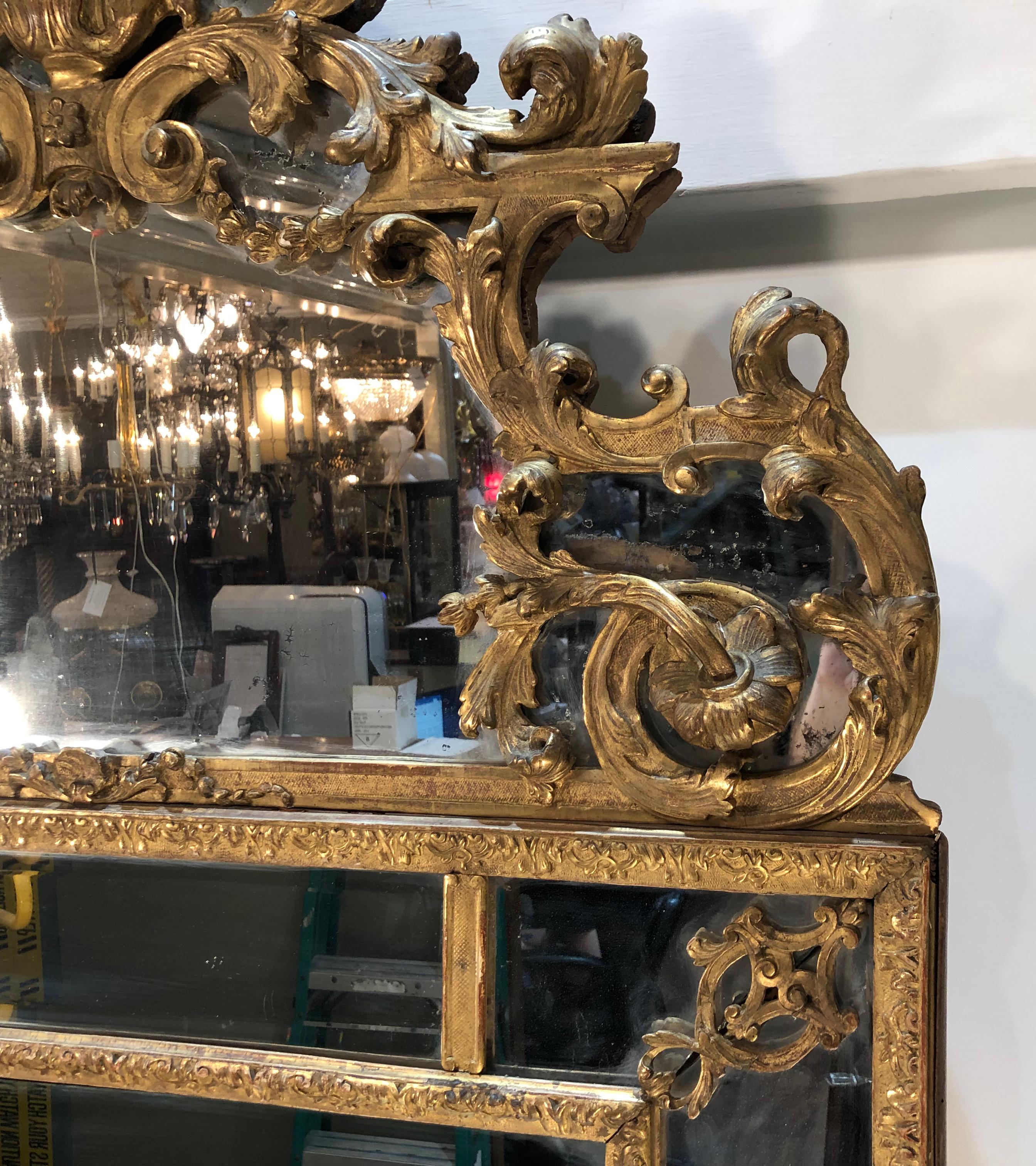 Gold 18th Century French Régence Carved Giltwood Mirror