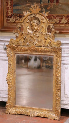 18th Century French Regence Carved Giltwood Wall Mirror with Cherub Crest