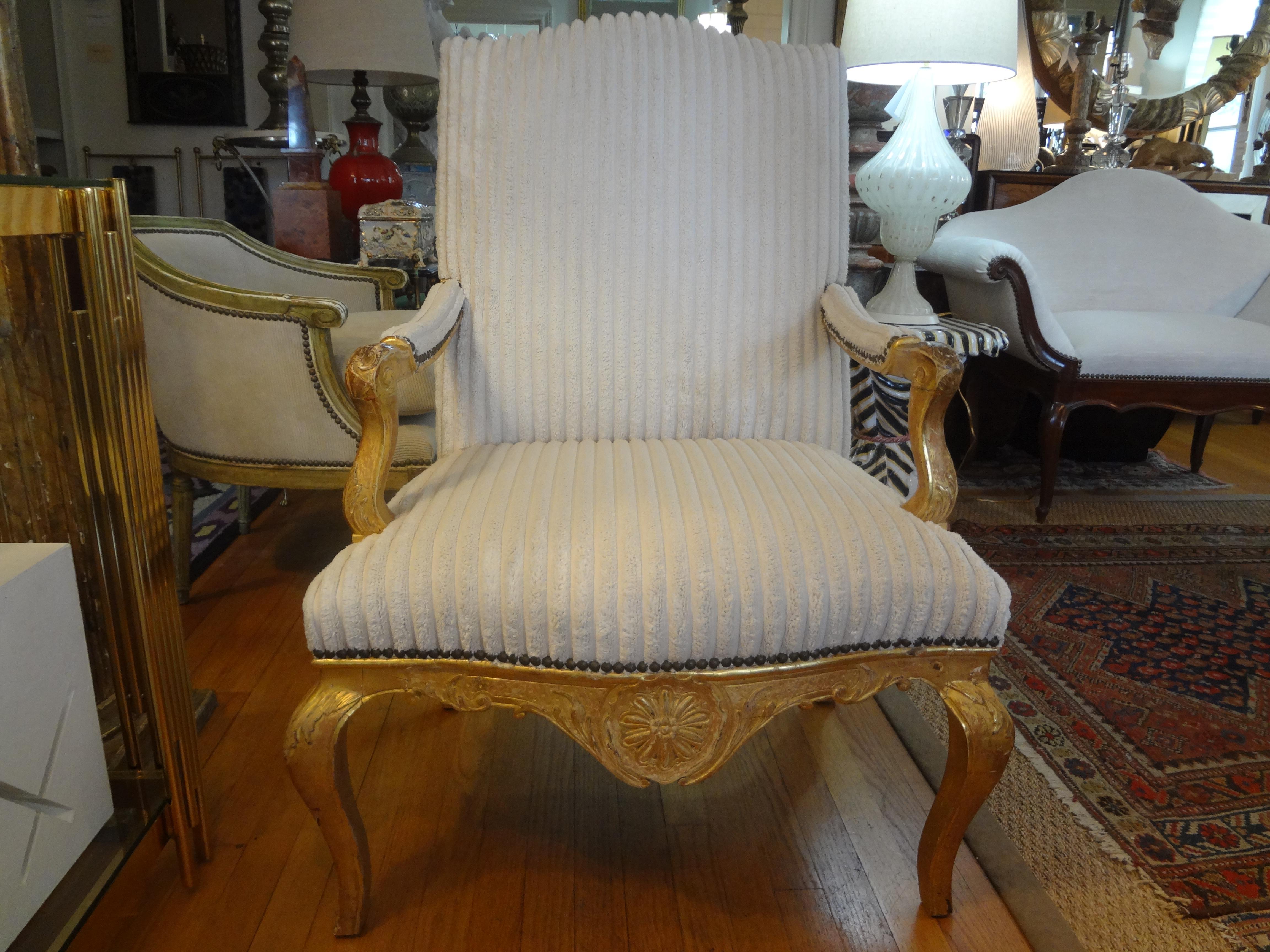 18th Century French Régence Giltwood Chair.
Stunning signed period 18th century French Regence giltwood fauteuil, armchair or side chair. This beautiful gilt wood chair has gorgeous carving, an unusual center medallion and fabulous patina. This