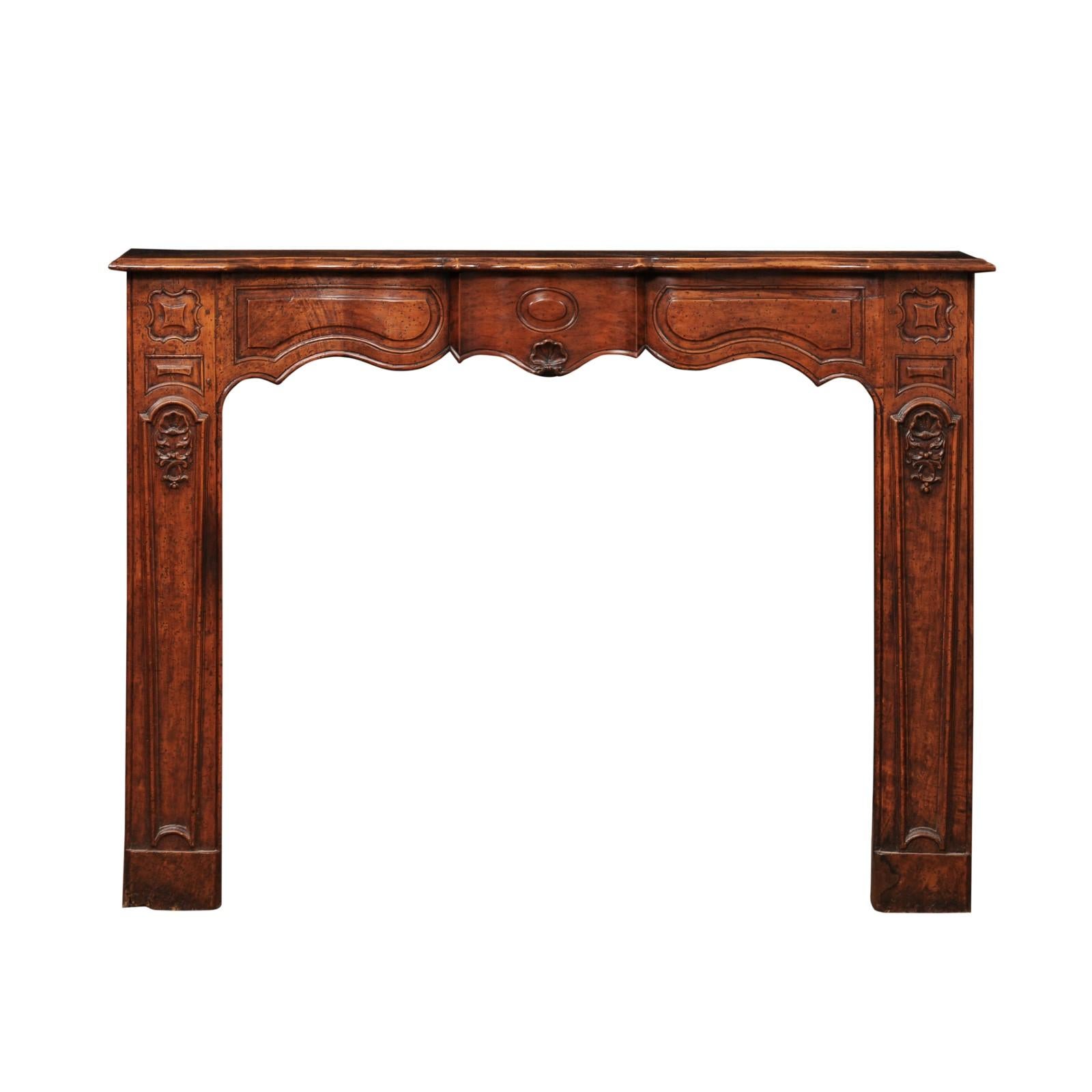 Regency 18th Century French Regence Style Walnut Mantle with Shell Carving For Sale