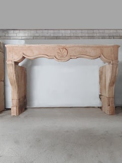18th Century French Regency Limestone Mantelpiece in Peach Color