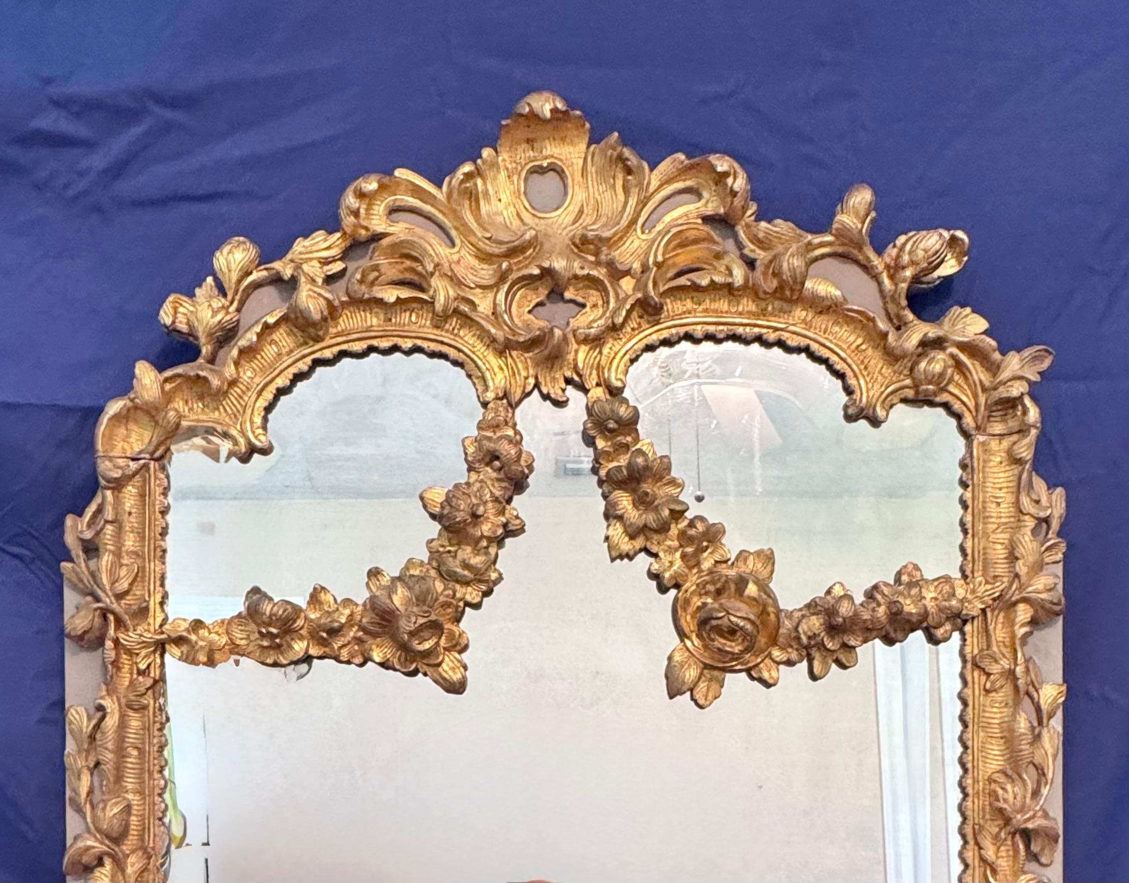 18th Century and Earlier 18th Century French Rococo Carved Giltwood Mirror For Sale