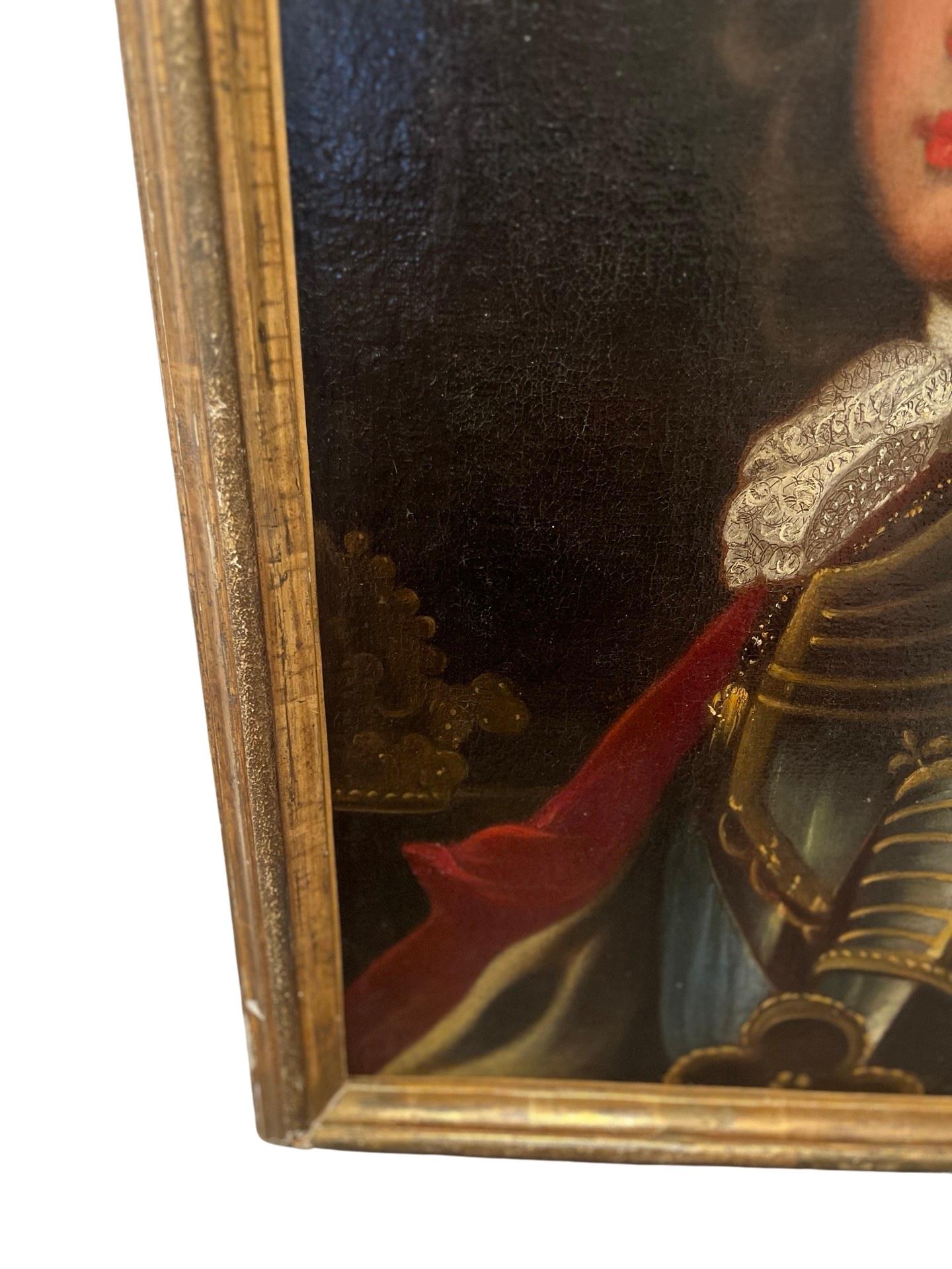French School, 18th century. Oil on Canvas painting set in an antique giltwood frame. Unsigned. 

An 18th century portrait painting of a young Philip V or at this time Duke of Anjou. He was dressed in important armor, having gold detailing and a