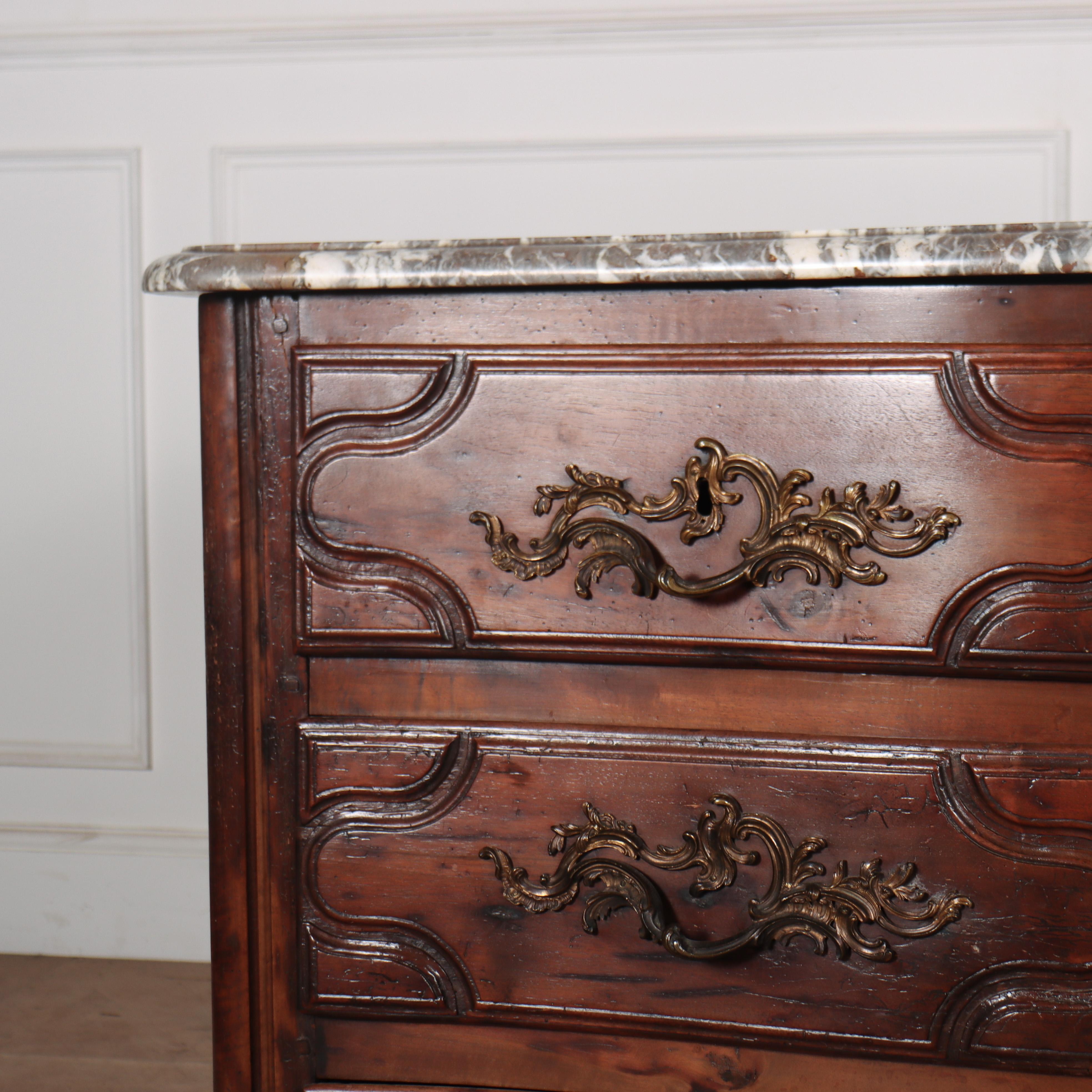 Exceptional 18th C French fruitwood serpentine three drawer commode with a wonderful 1.25