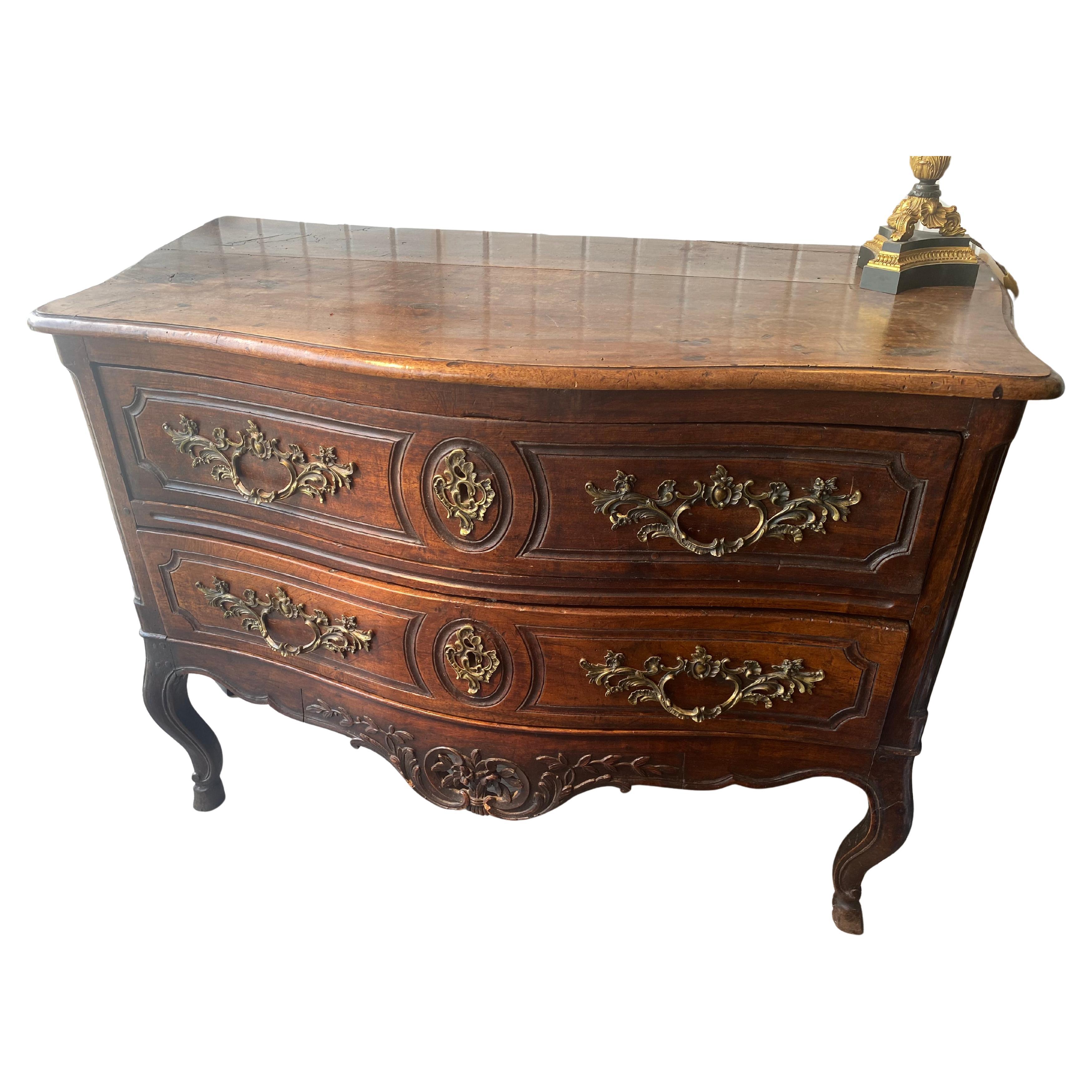 18th Century French serpentine front commode raised on legs with hooved feet