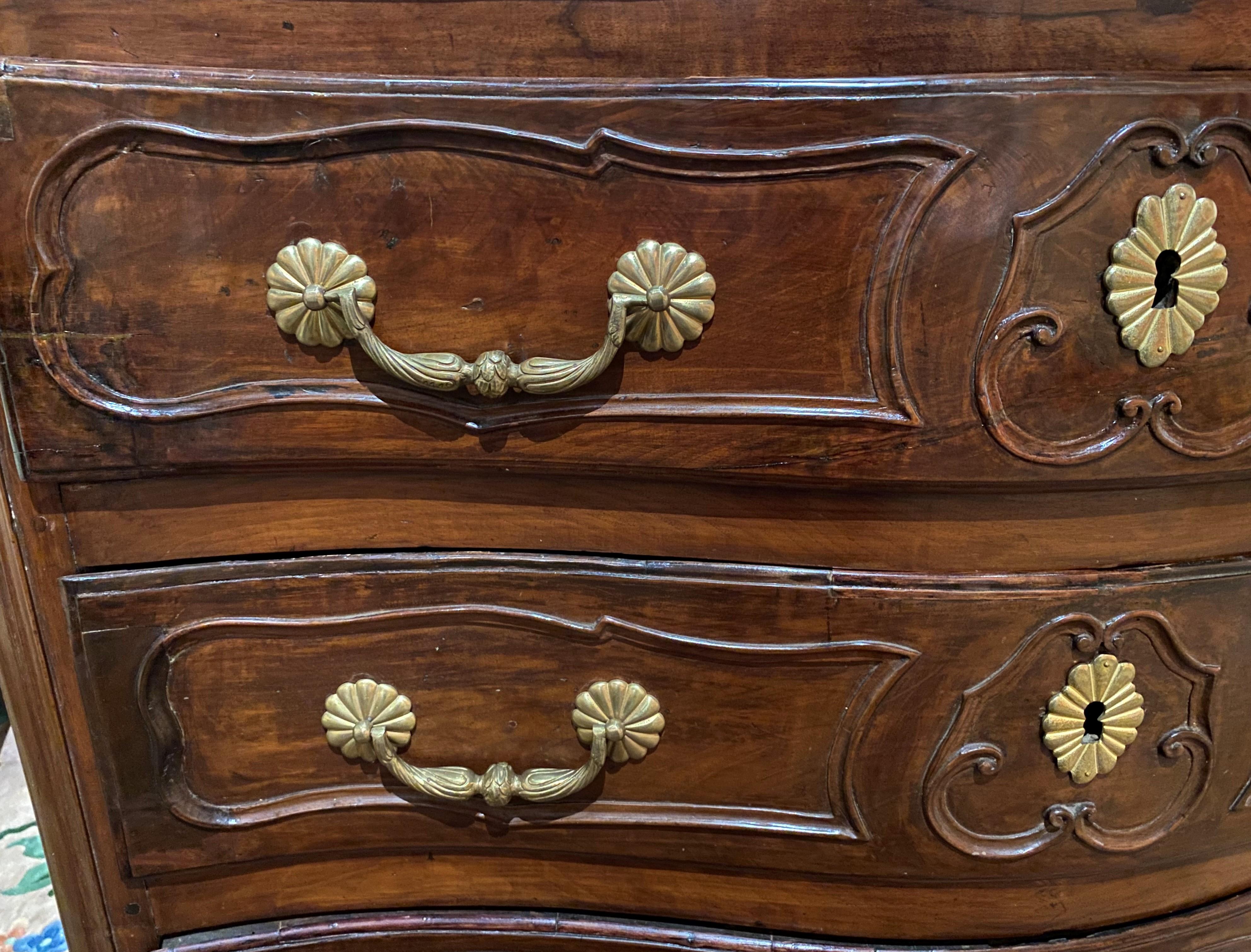 Hand-Carved 18th Century French Serpentine Three Drawer Commode with Gilt Brass Pulls For Sale