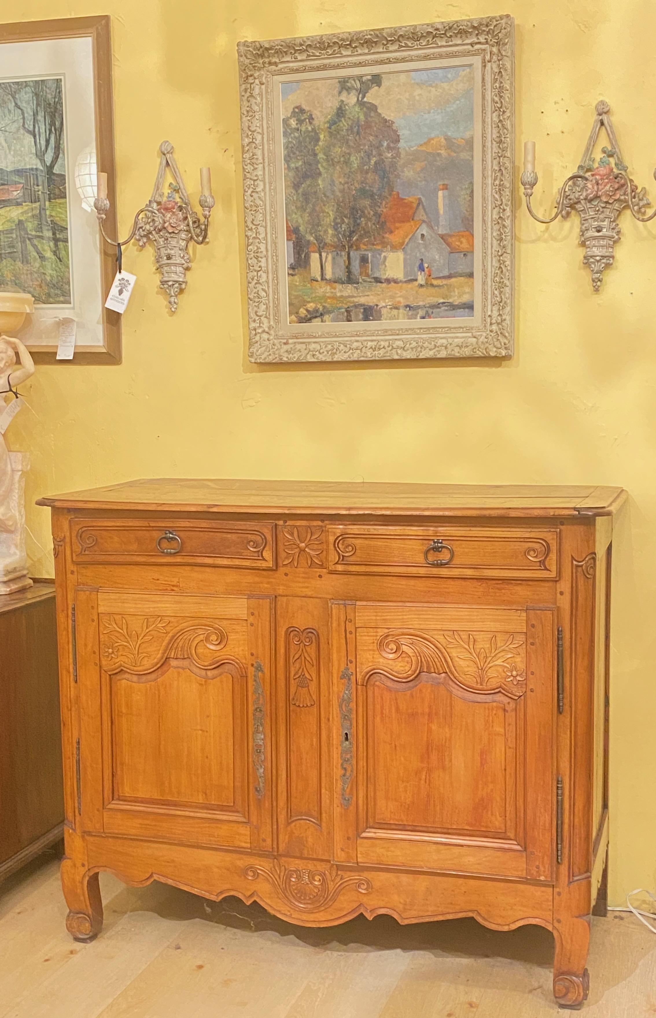 An excellent example of a traditional French Provincial cherry wood buffet with original key.
In excellent antique condition and having a beautiful satin finish.
This was most likely Buffet de Corp so there would have been a top section, and the