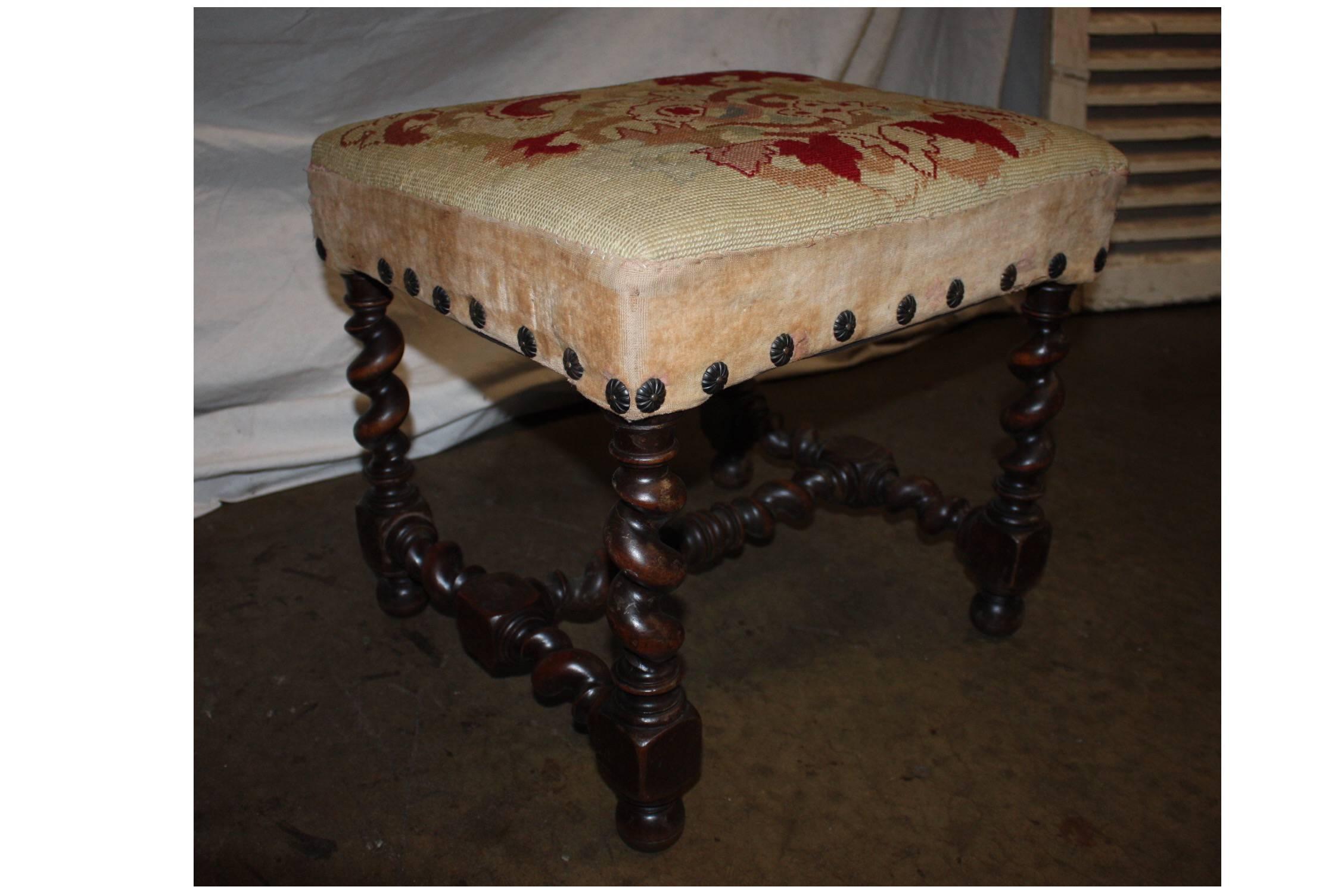 18th century French stool with a needle point work.