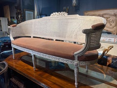 18th Century French Three Seated Hand Carved Wooden Cane Canapé Louis XVI Period