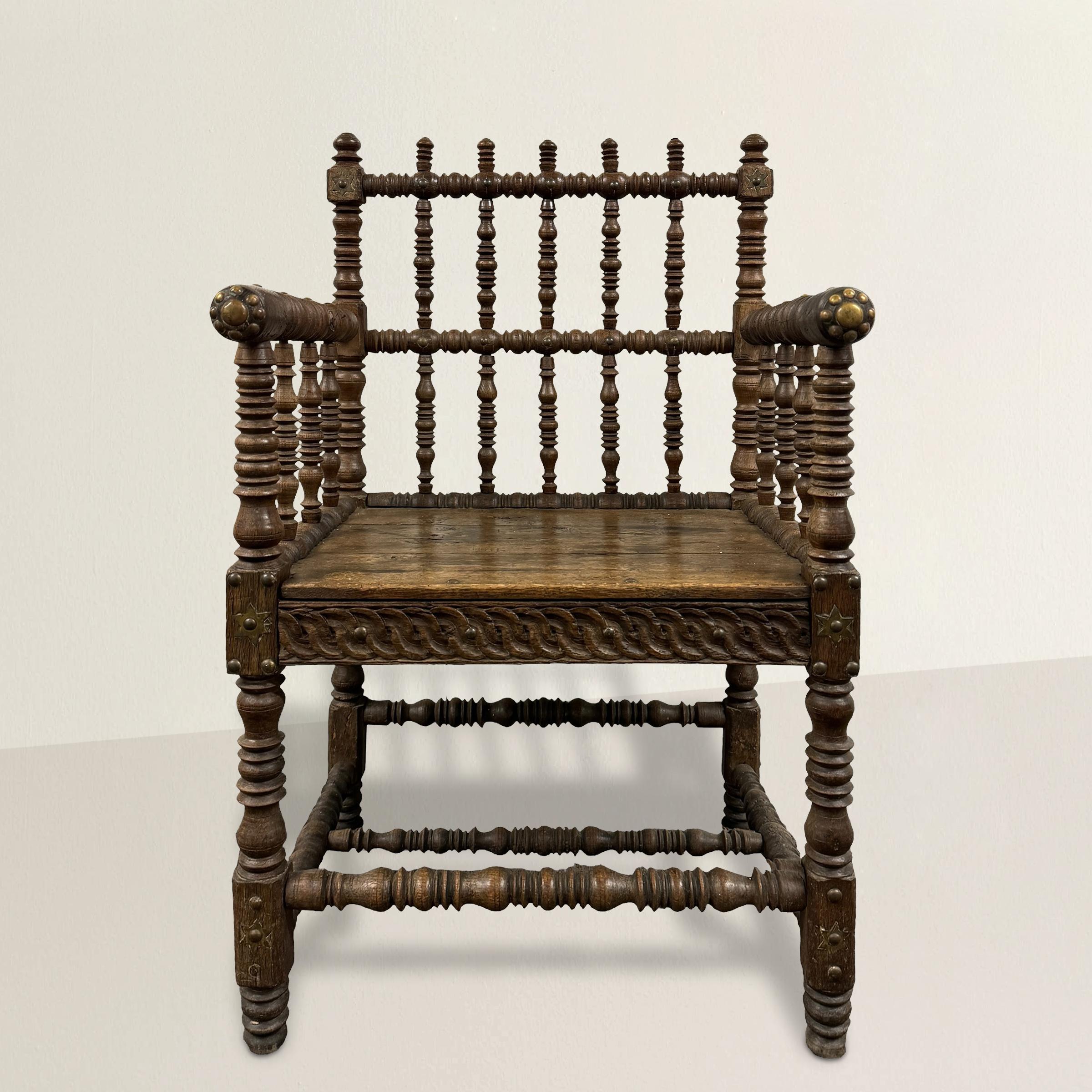 This 18th-century French Turner's chair is a masterful example of Baroque craftsmanship and elegance. Turner's chairs were created by skilled professional wood turners to showcase their exceptional skill level to prospective customers. Originating