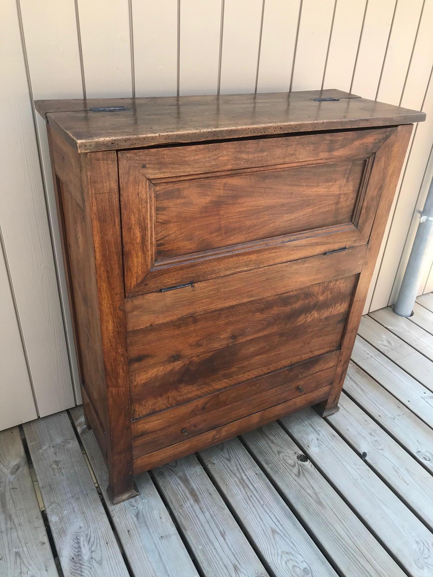 Very nice and original 18th century French walnut bread pannetiere or bread cupboard.
Opening on the top and in front to put the bread in. 
A large drawer to collect the bread crumbs. 
There is a rack on the inside bottom to put the bread on.