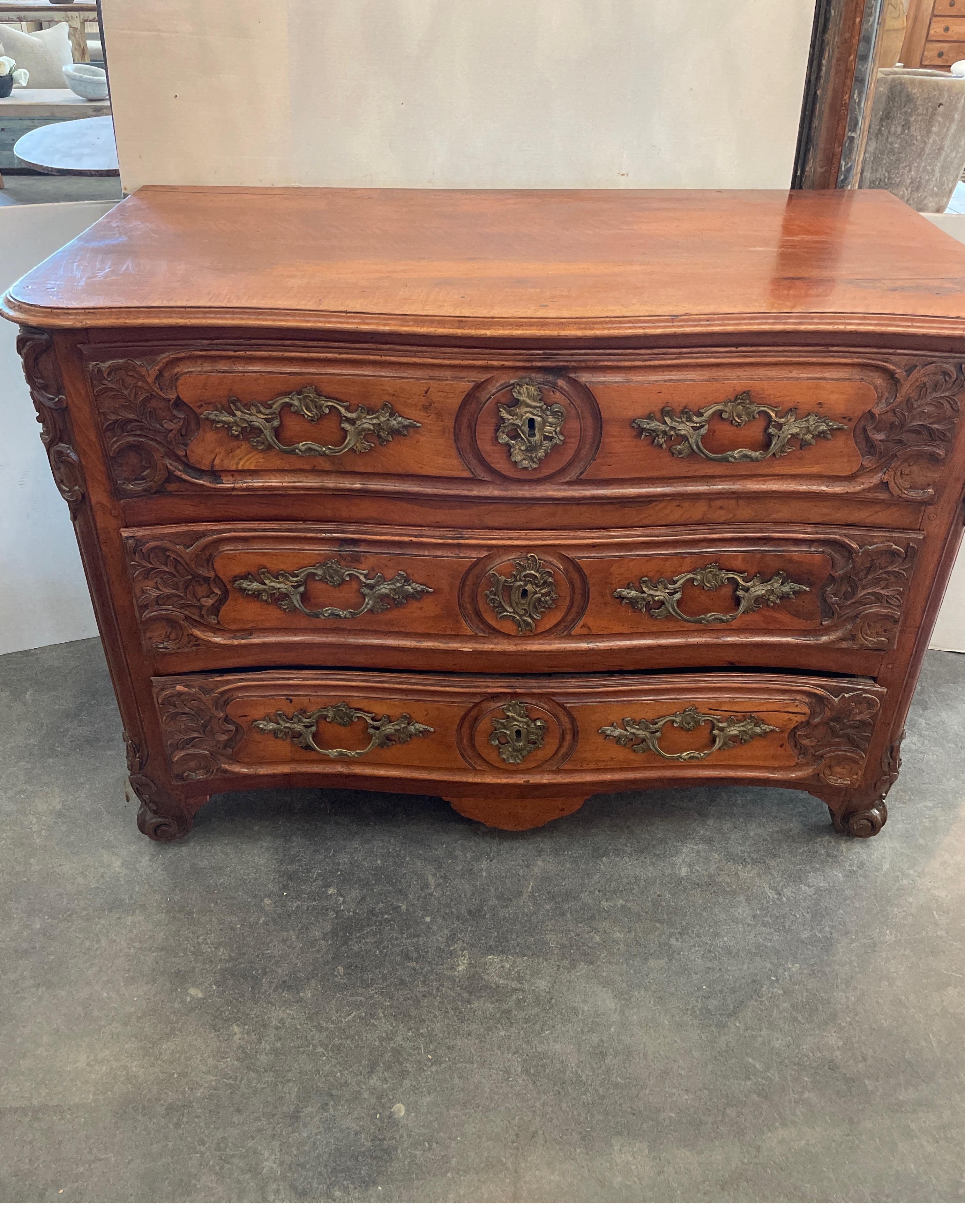 18th Century and Earlier 18th Century French Walnut Commode with Brass Fixtures For Sale