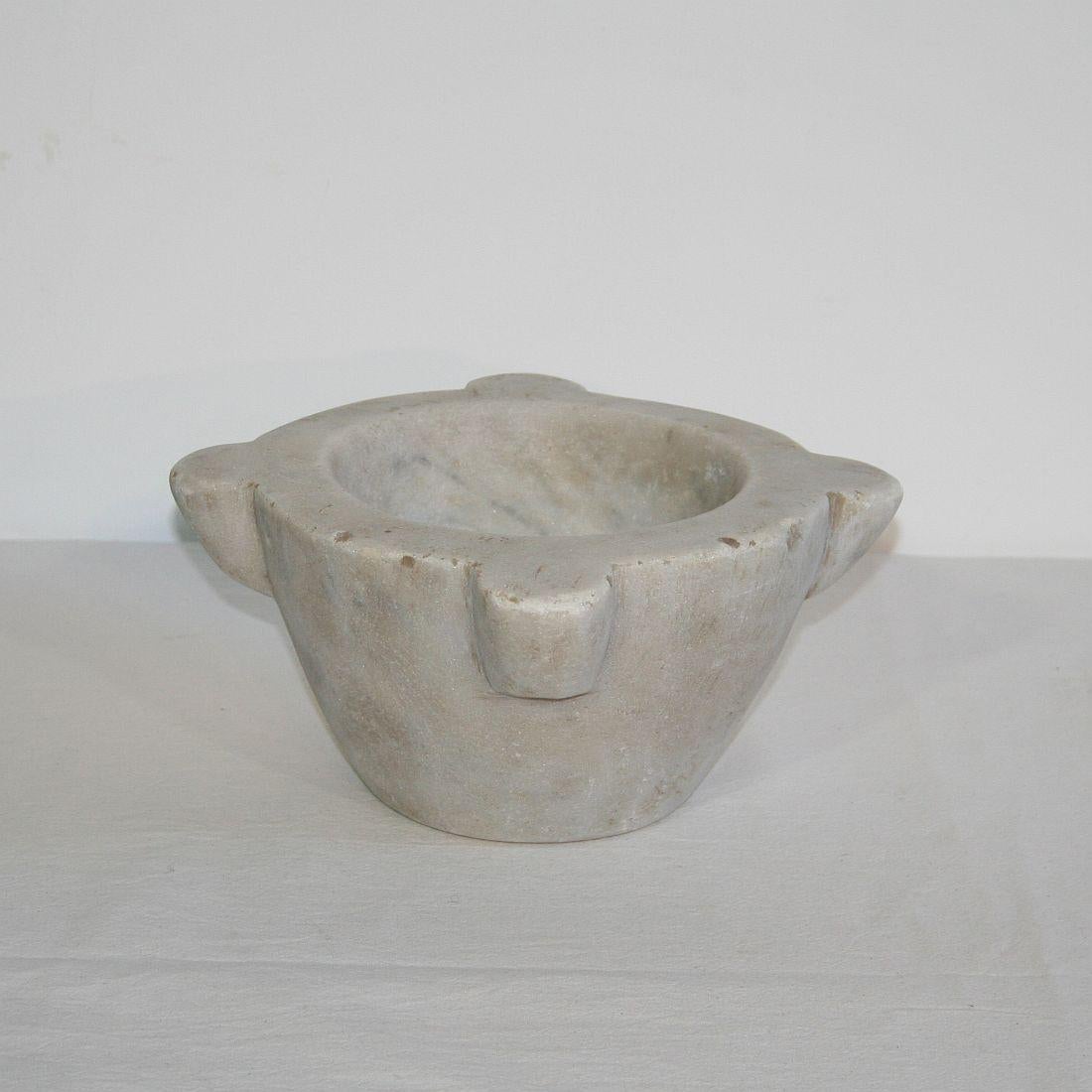 Primitive white marble Mortar, France, 18th century. Weathered.