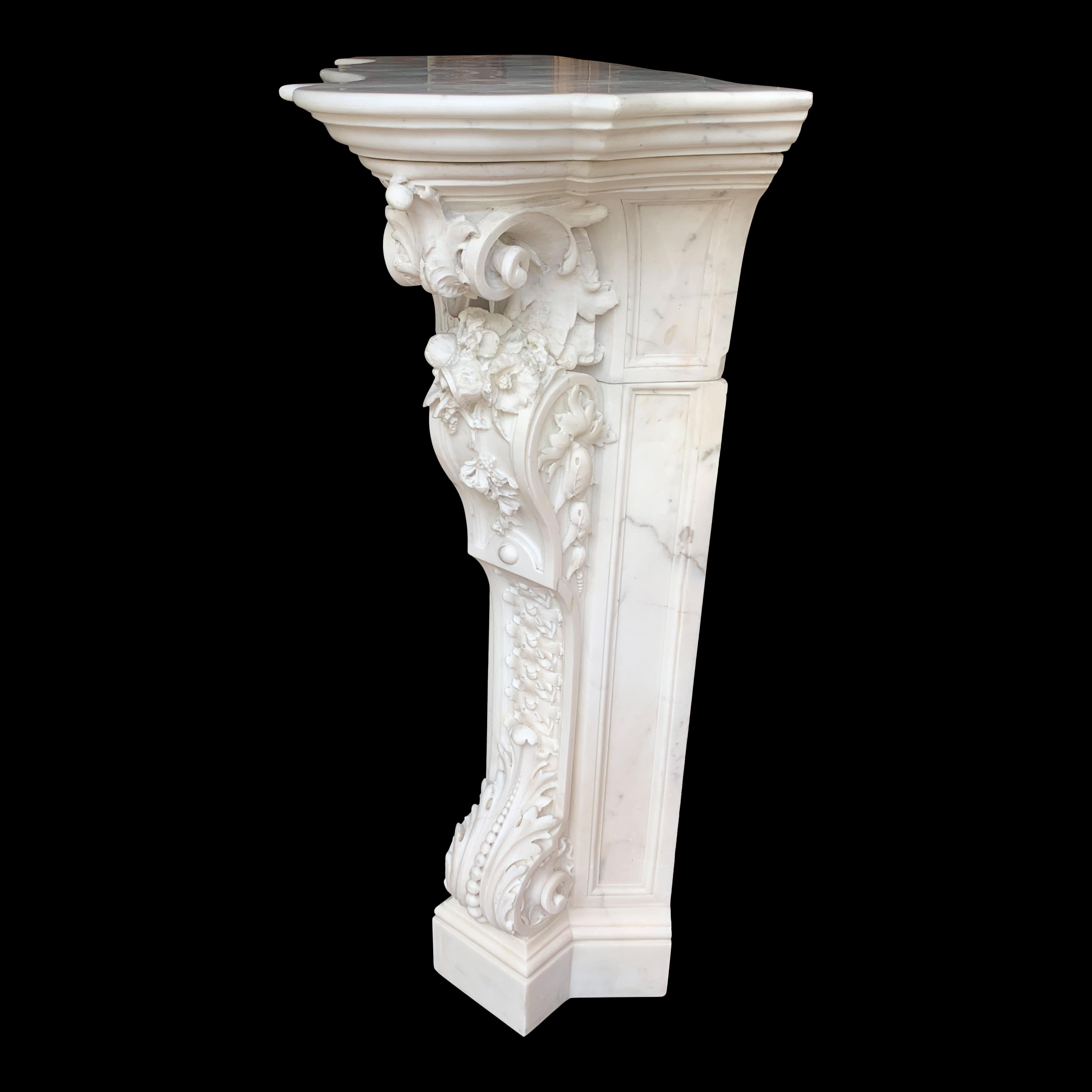 Hand-Carved 18th Century French White Statuary Chimneypiece For Sale