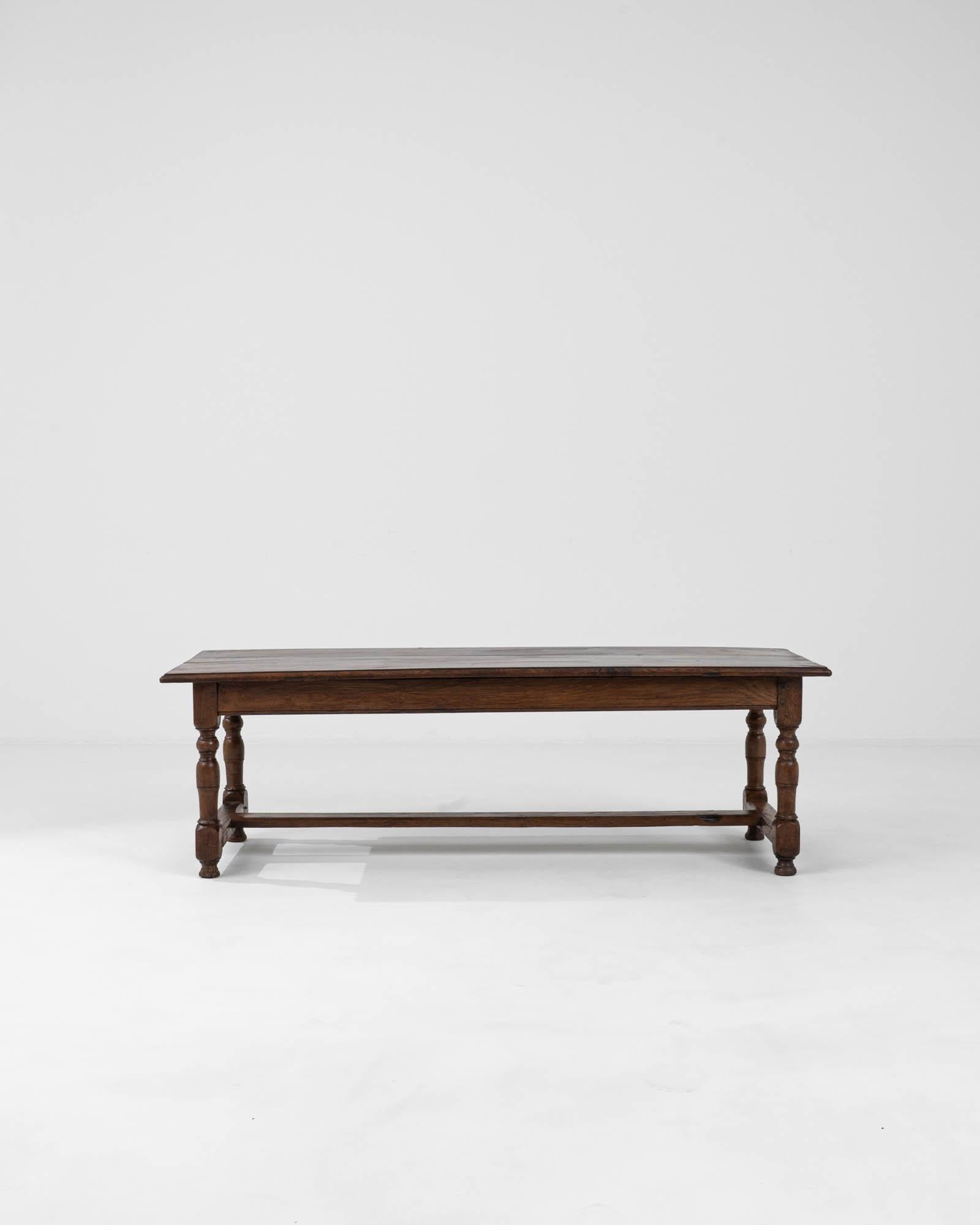 Introducing the timeless elegance of the 18th Century French Wooden Coffee Table, a true artifact that brings the charm of antiquity right into your living space. This exquisite piece showcases the coveted original patina, a testament to its