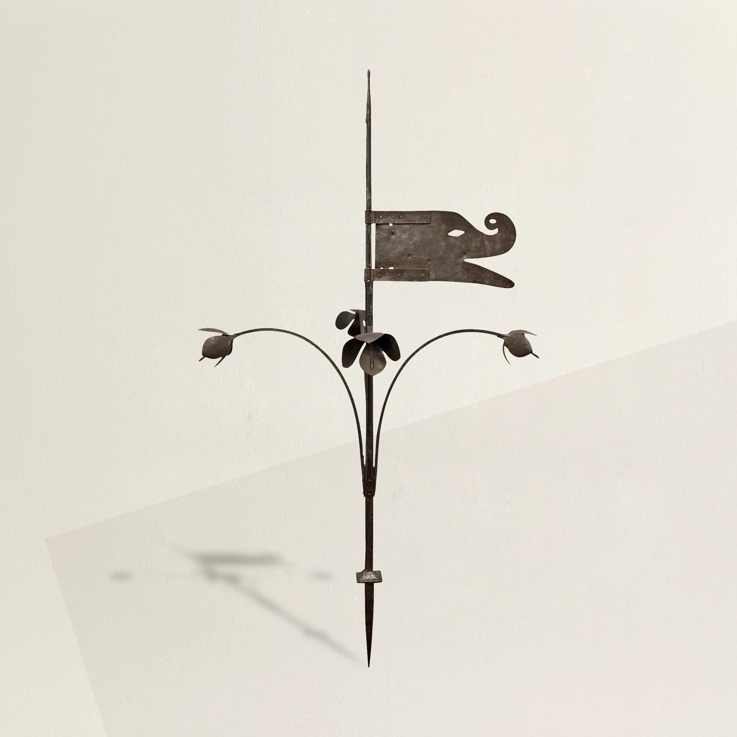 A stunning and rare 18th century French hand-wrought iron weathervane, from Normandy, with a stylized dragon 