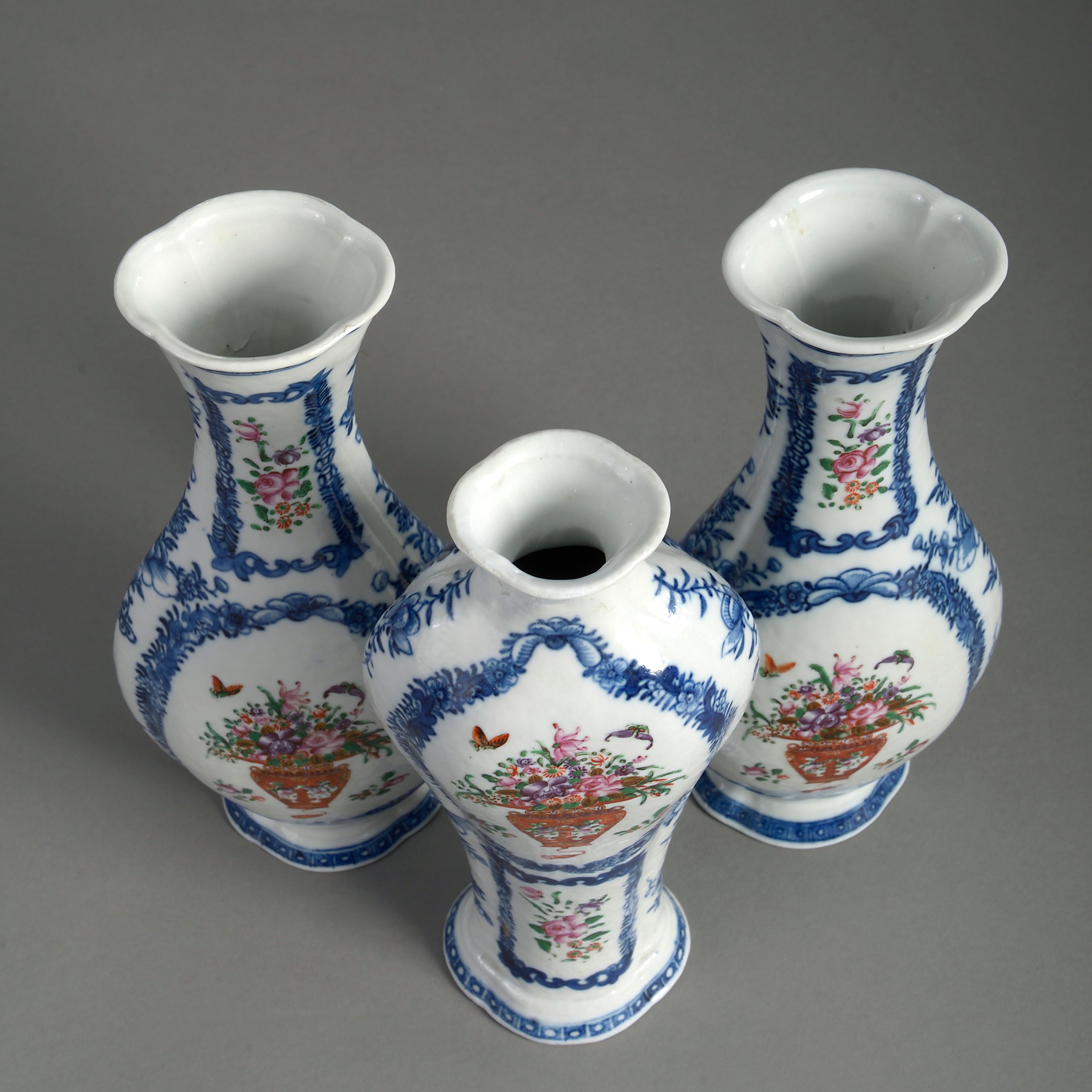 Fired 18th Century Garniture of Three Qianlong Period Famille Rose Porcelain Vases