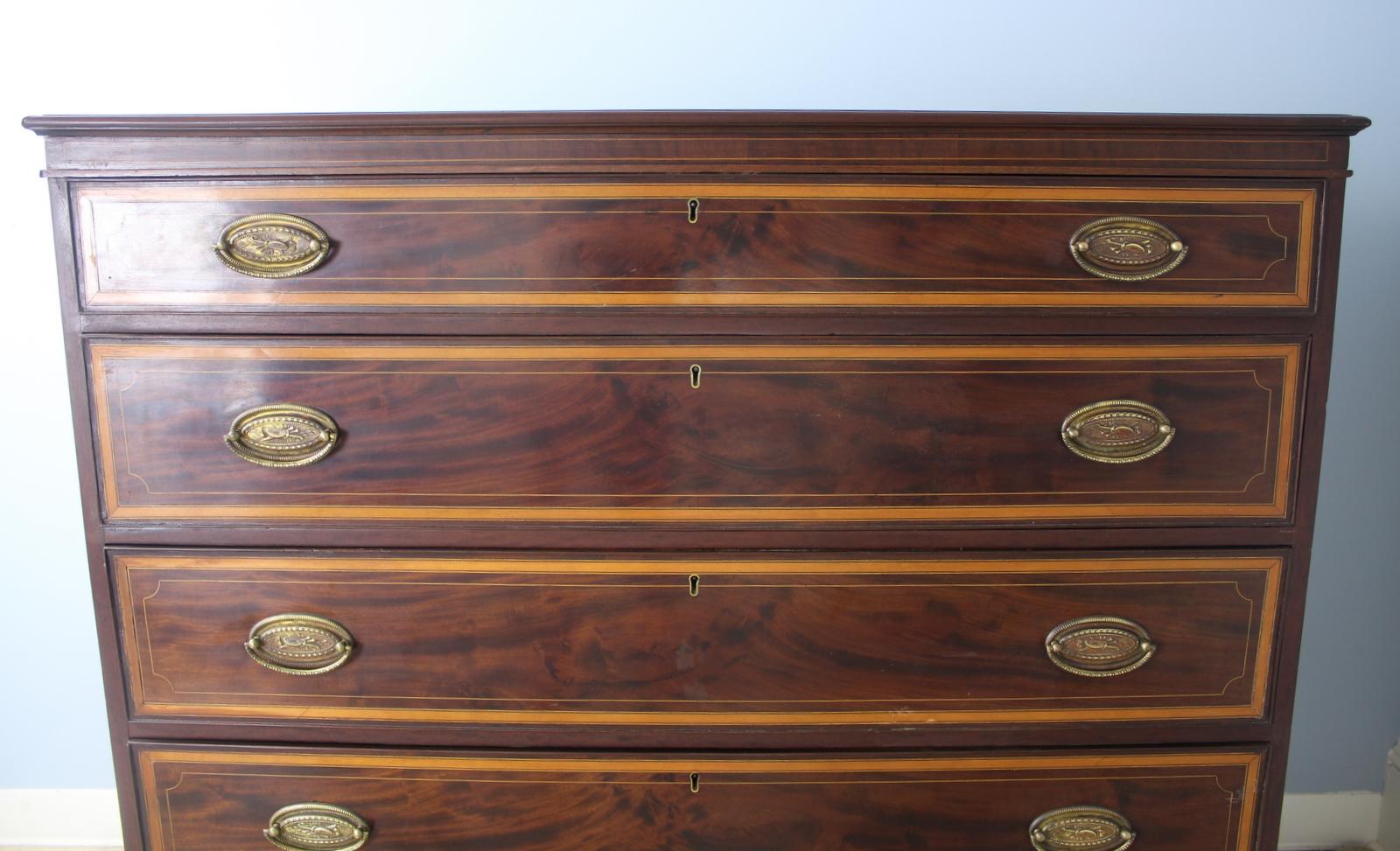 antique dresser with small drawers on top