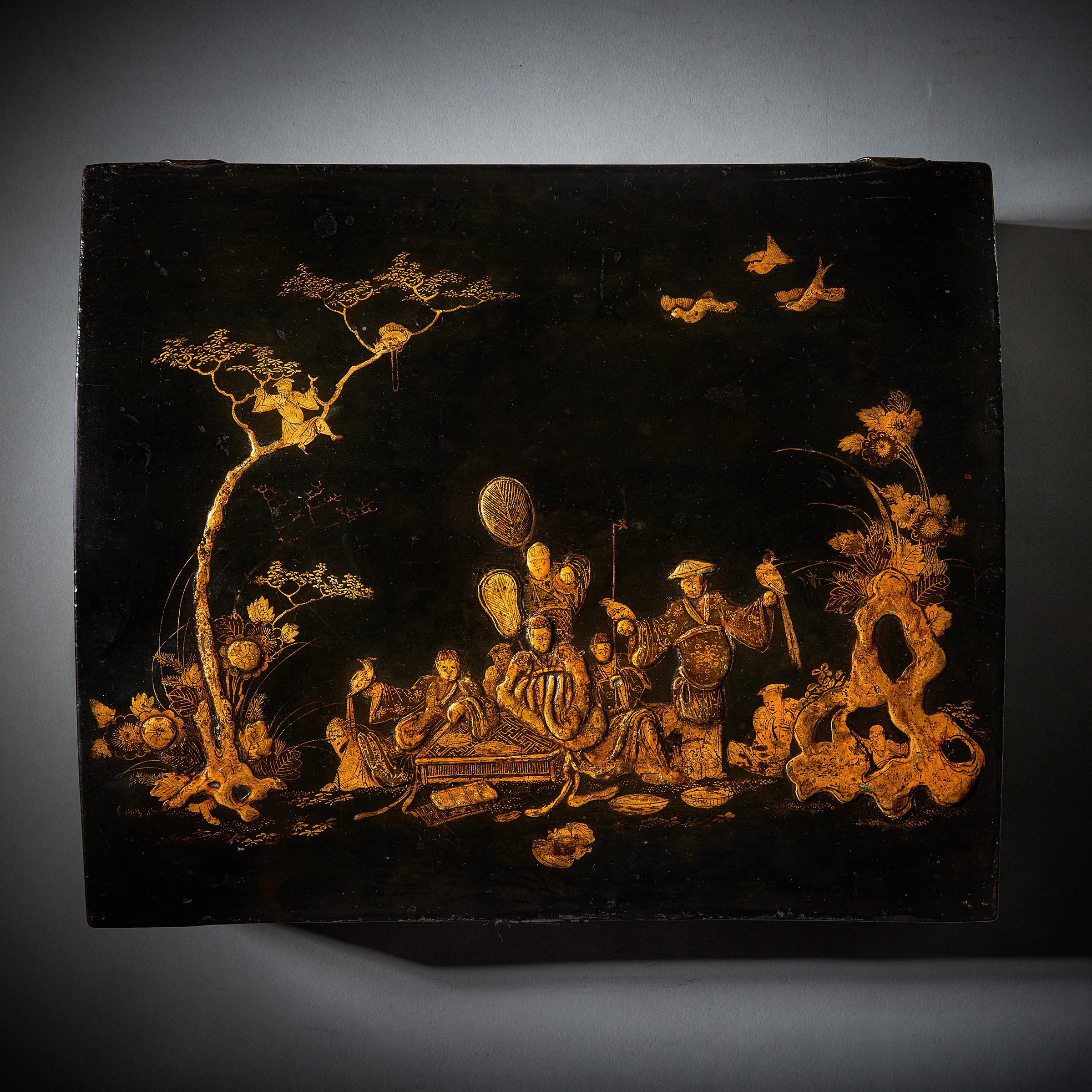 A rare and important Queen Anne-George I japanned chinoiserie domed topped box depicting scenes of falconry, circa 1710-1720. England

Falconry is an ancient sport that has been practised since preliterate times. Stelae depicting falconry that