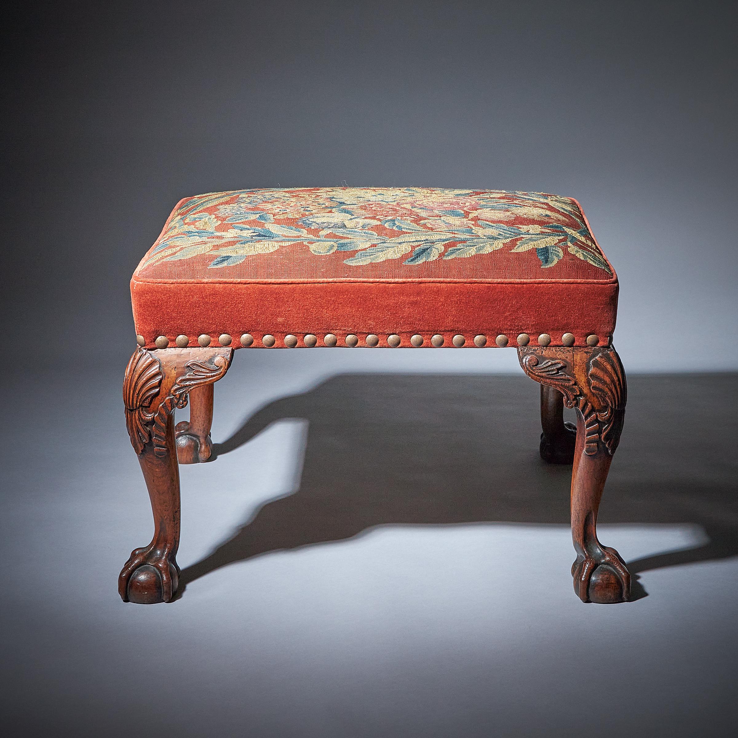 An Important 18th century George II Carved Walnut Stool, Circa 1730-1740 England. 

Sitting on four solid walnut carved cabriole legs eared with scrolling leaves of acanthus, scallop shells to each knee and trailing pendant each terminating on