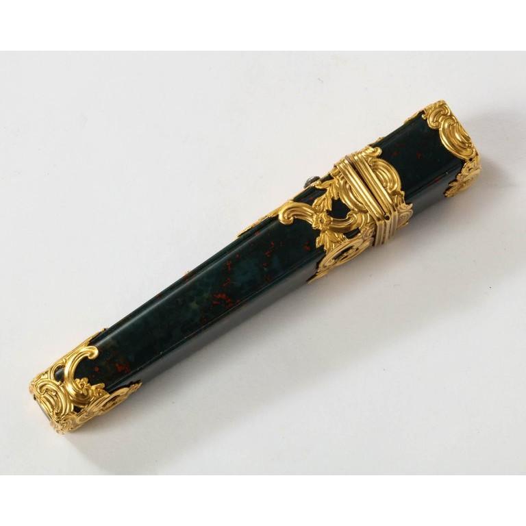 An 18th century George II gold and bloodstone etui case,  circa 1760.  With diamond push-piece   Measures: height 4 in.  Mint condition. Very beautiful and high quality object.